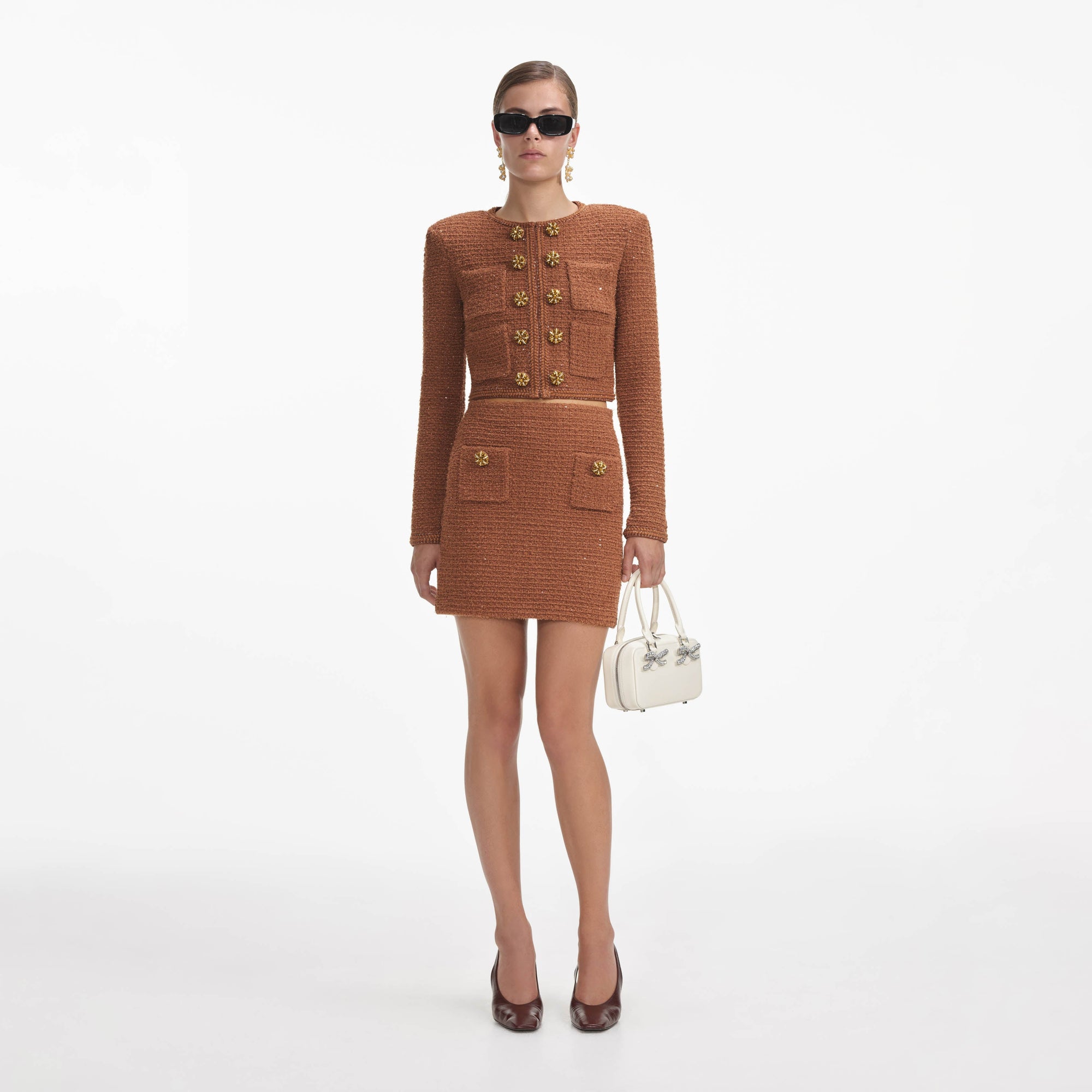 Front view of a woman wearing the Brown Textured Knit Jacket