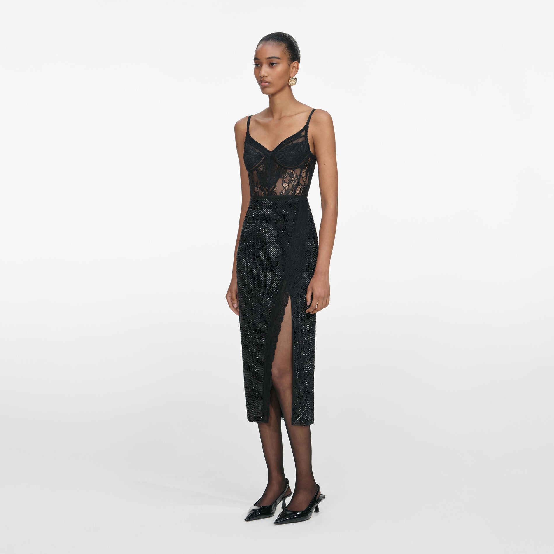 Side view of a woman wearing the Black Lace Strappy Top