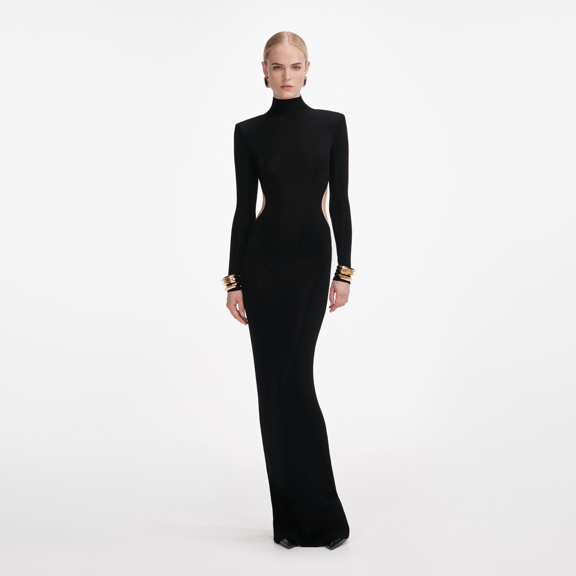 Front view of a woman wearing the Black Viscose Knit Cut Out Maxi Dress