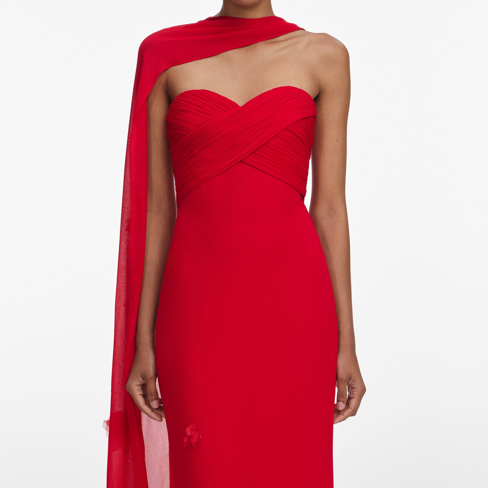 A close up of a woman wearing the Red Georgette Flower Maxi Dress