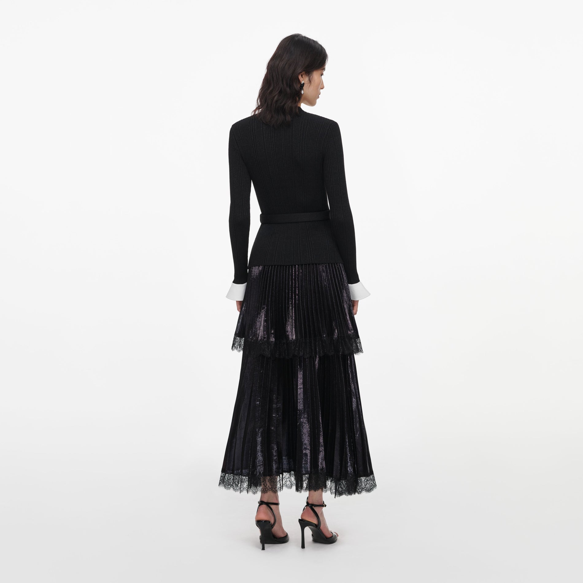 Back view of a woman wearing the Black Knit Metallic Chiffon Midi Dress