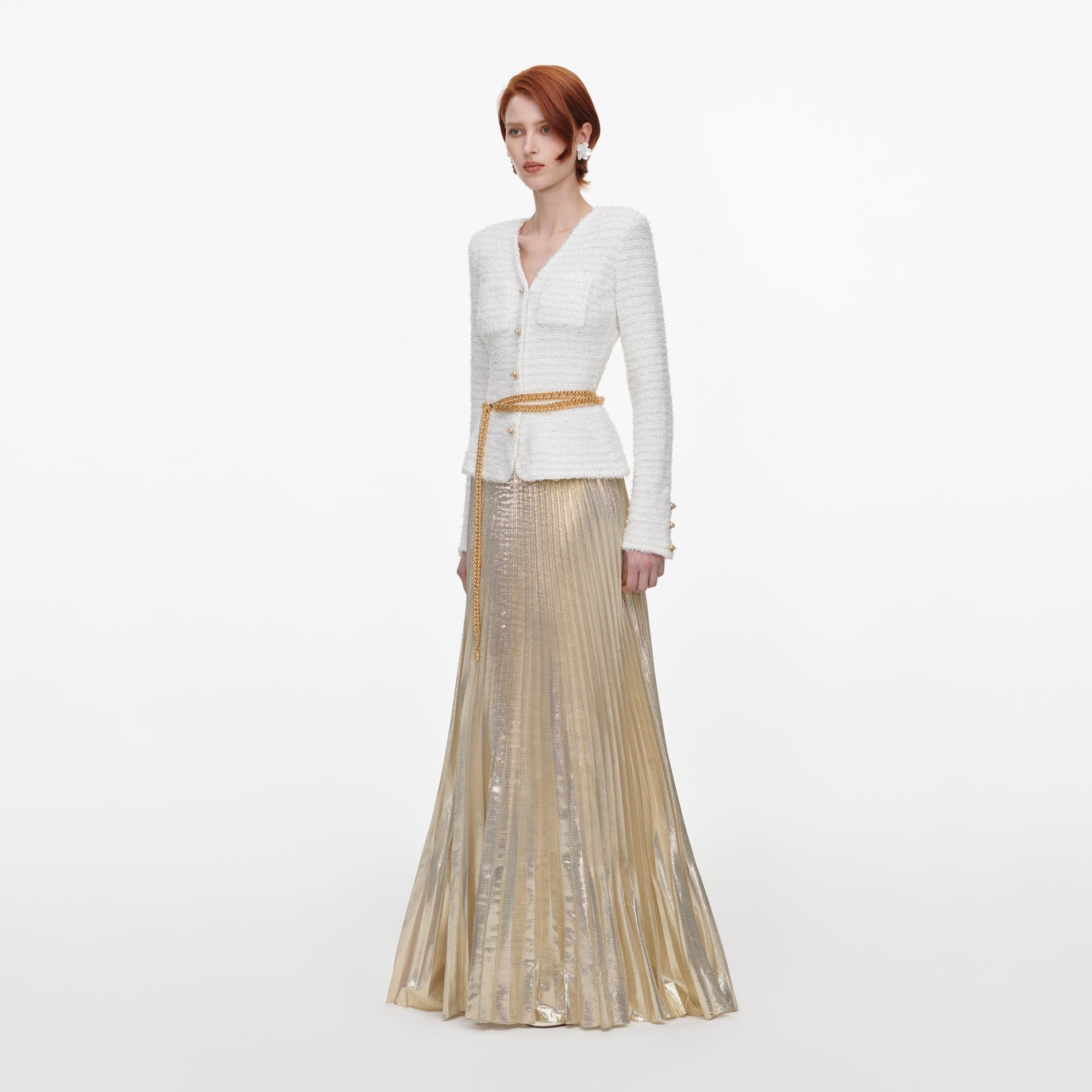 Side view of a woman wearing the Cream Textured Knit Metallic Chiffon Maxi Dress