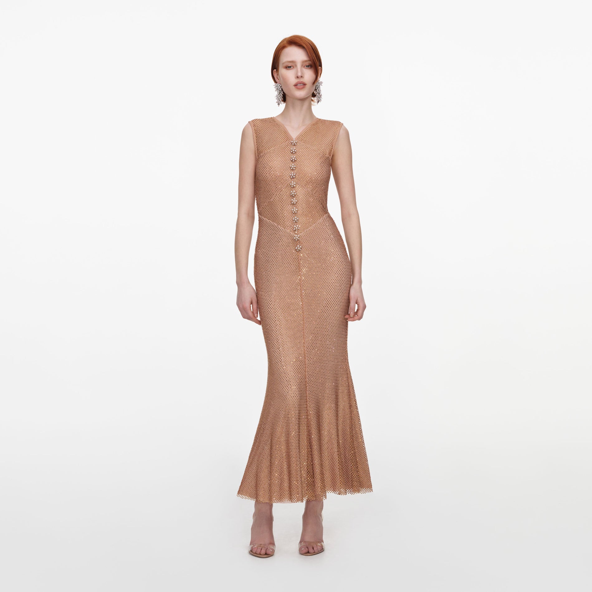Front view of a woman wearing the Champagne Rhinestone Fishnet Midi Dress