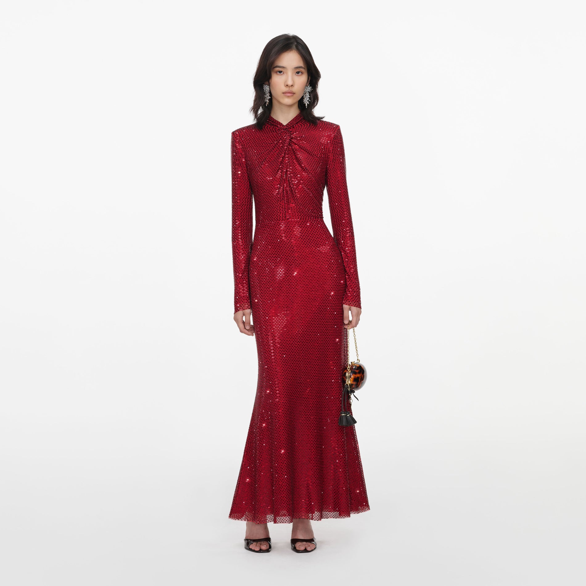 Front view of a woman wearing the Red Rhinestone Mesh Twist Midi Dress