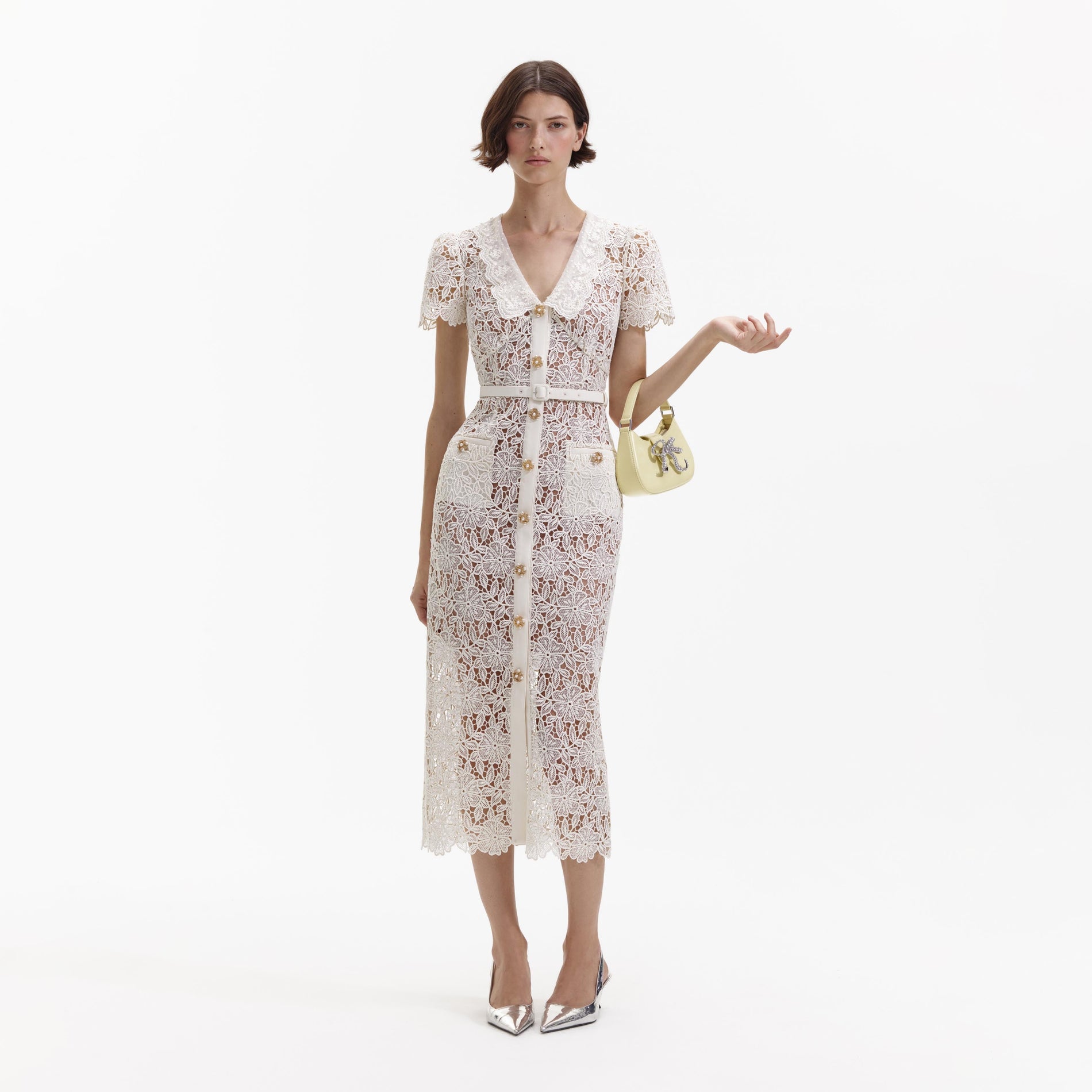 Front view of a woman wearing the Cream Lace Midi Dress
