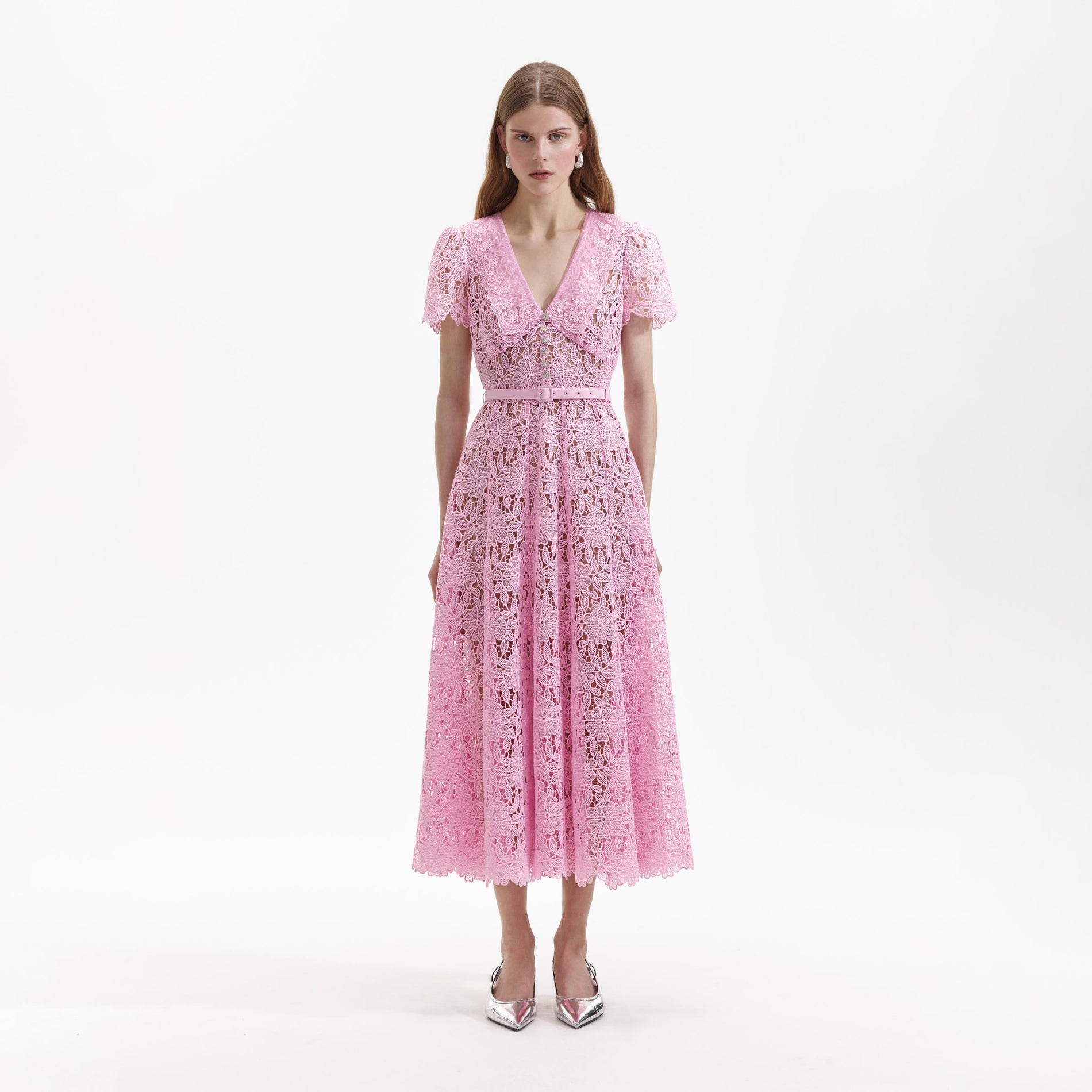 Front view of a woman wearing the Pink Guipure Midi Dress