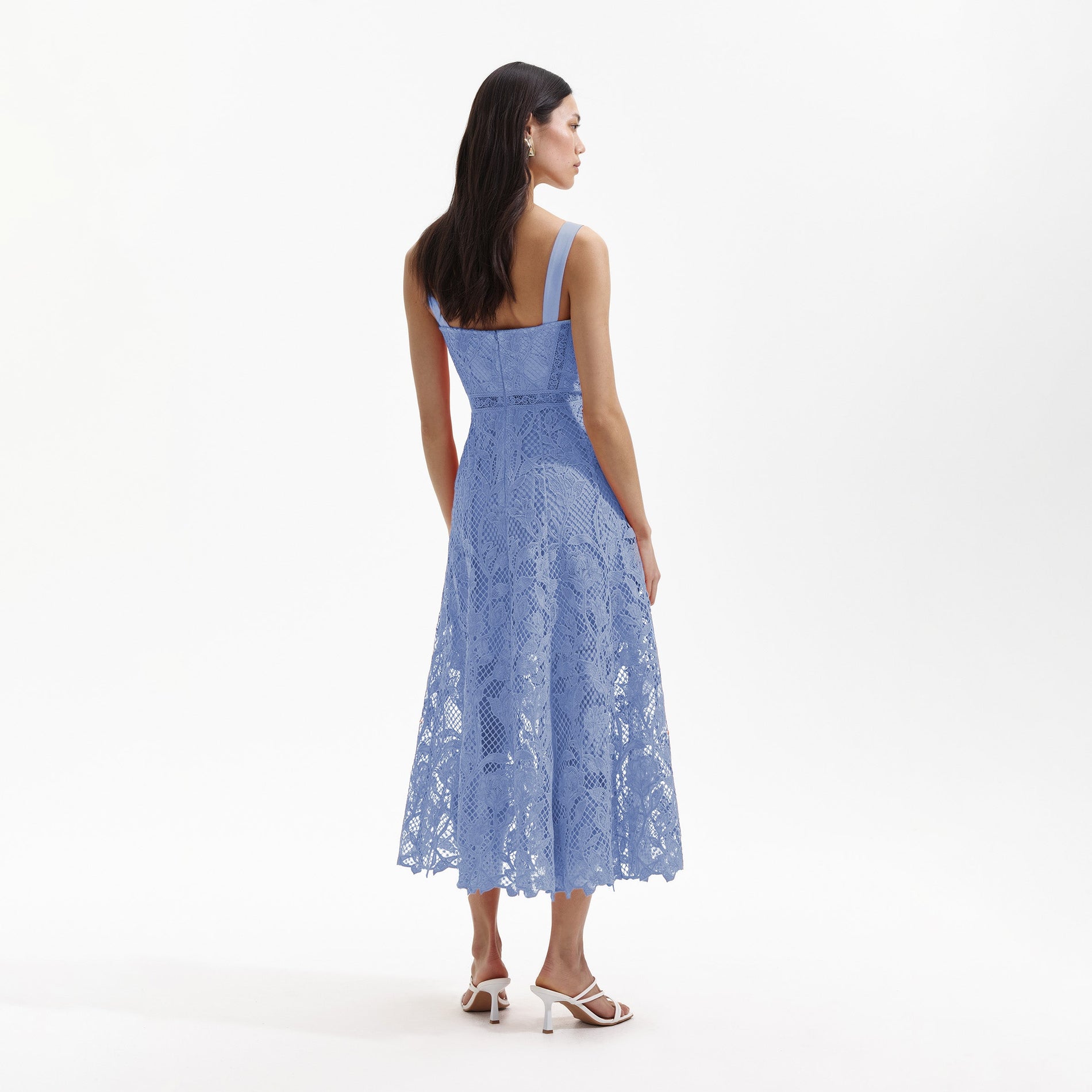 Back view of a woman wearing the Blue Lace Midi Sweetheart Dress