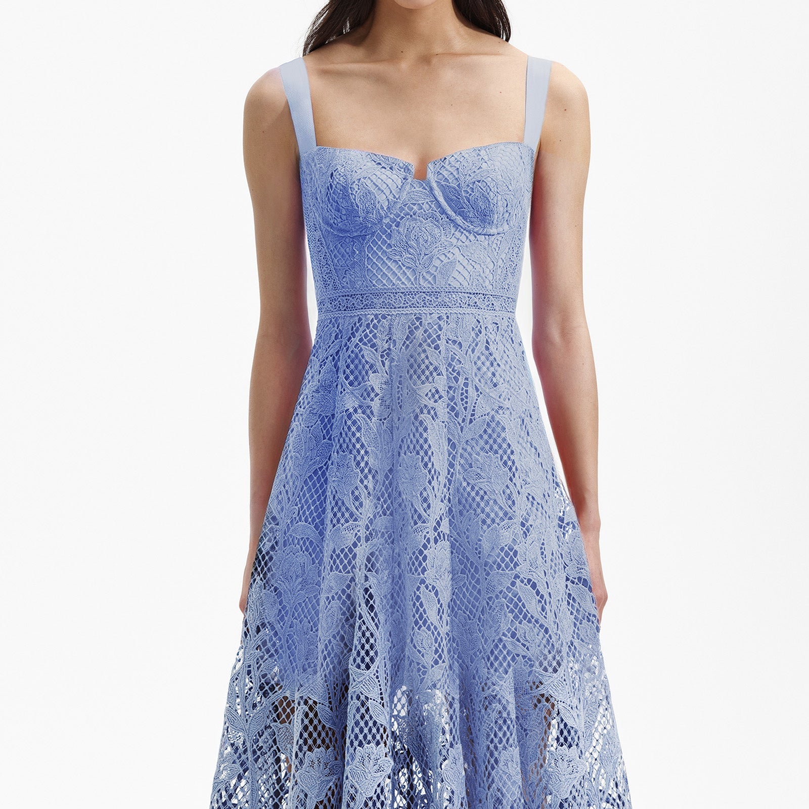 A close up of a woman wearing the Blue Lace Midi Sweetheart Dress