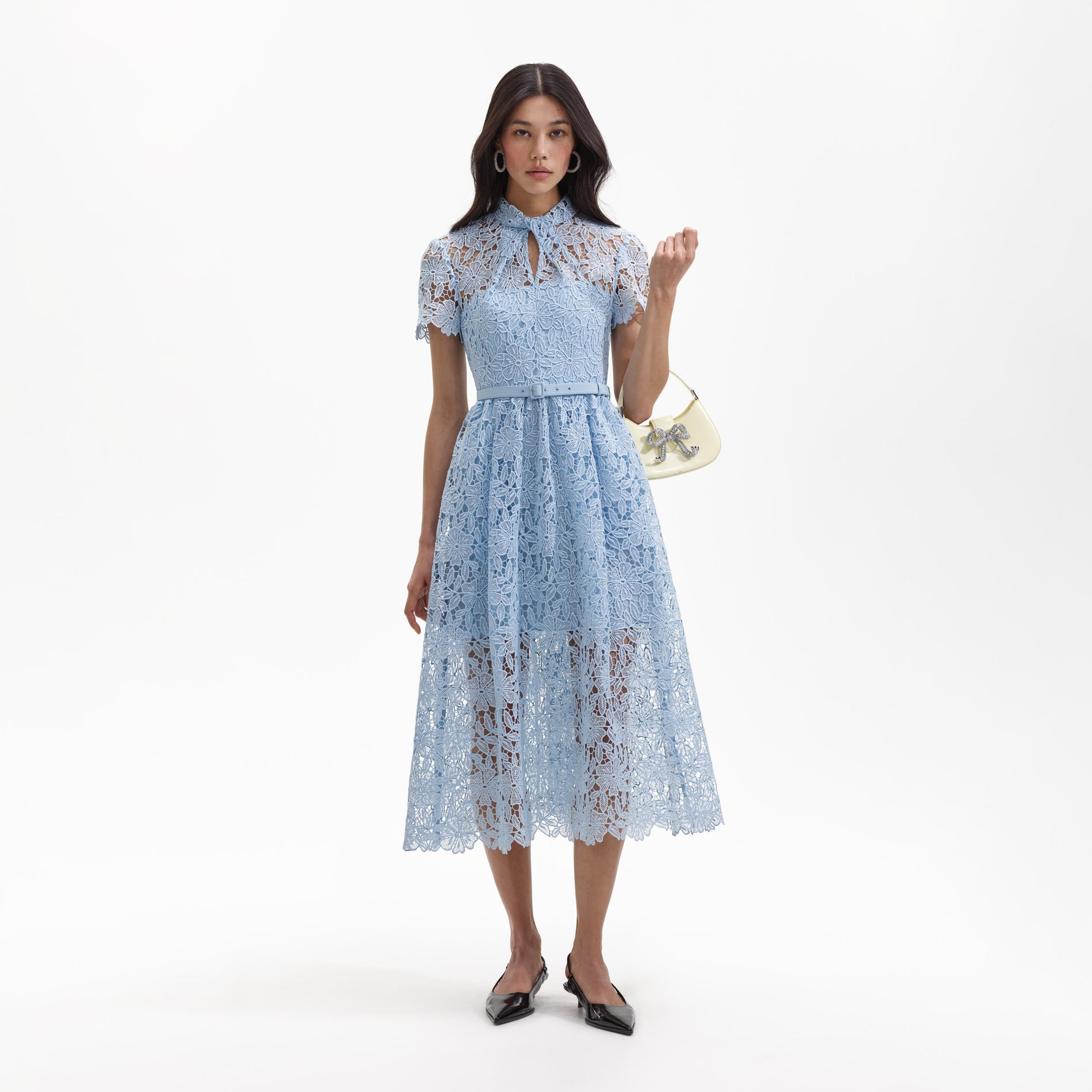 Front view of a woman wearing the Blue Lace Keyhole Midi Dress