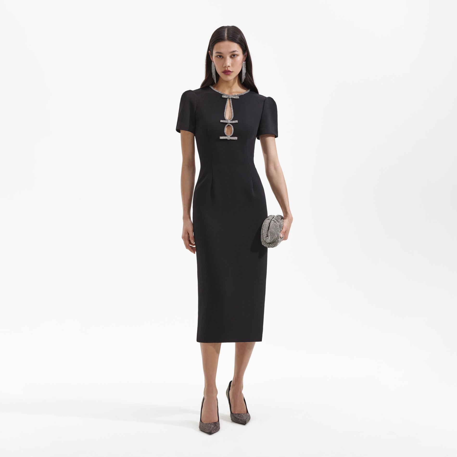 Front view of a woman wearing the Black Crepe Diamante Bow Midi Dress