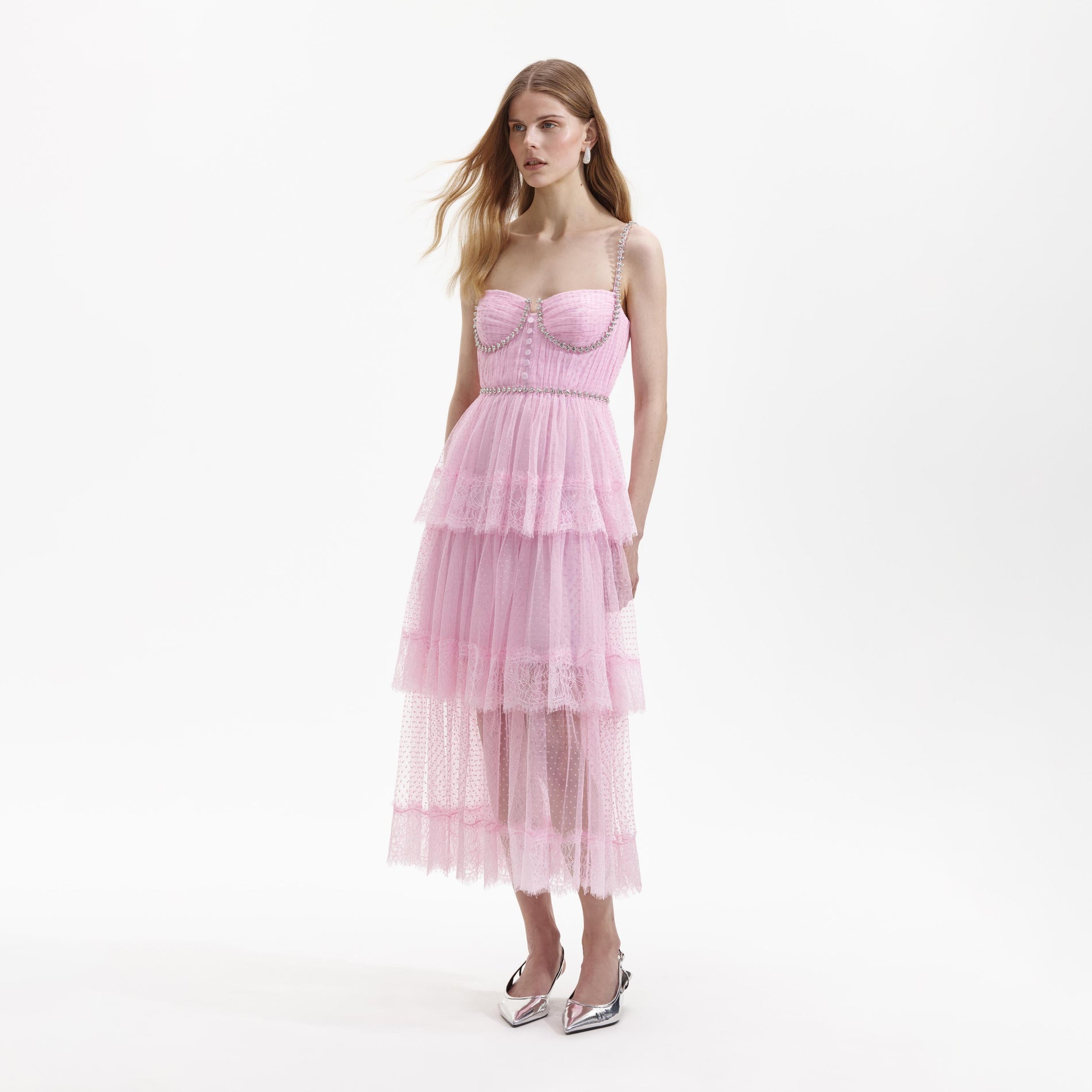 Side view of a woman wearing the Pink Dot Mesh Tier Midi Dress