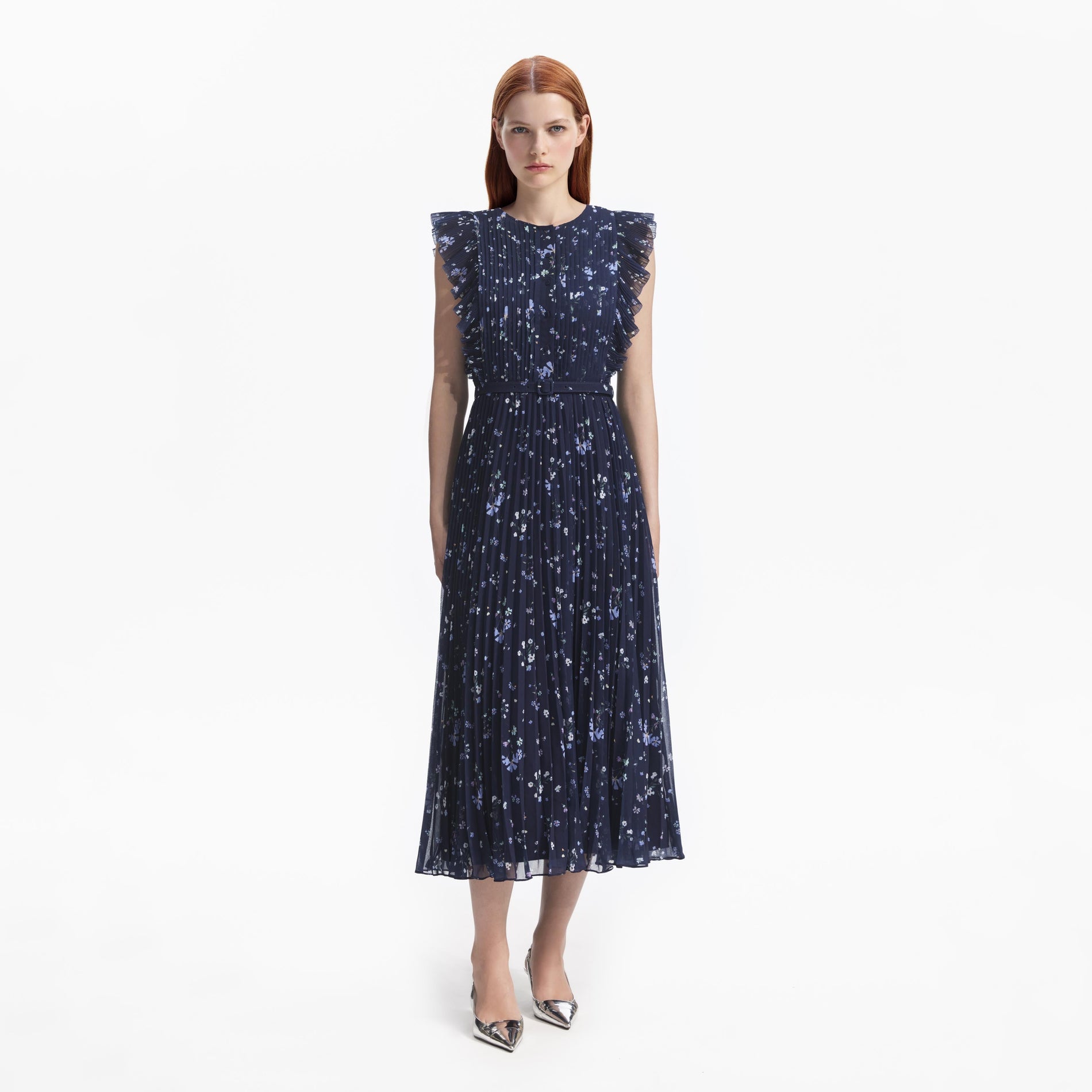 Front view of a woman wearing the Navy Floral Chiffon Midi Dress