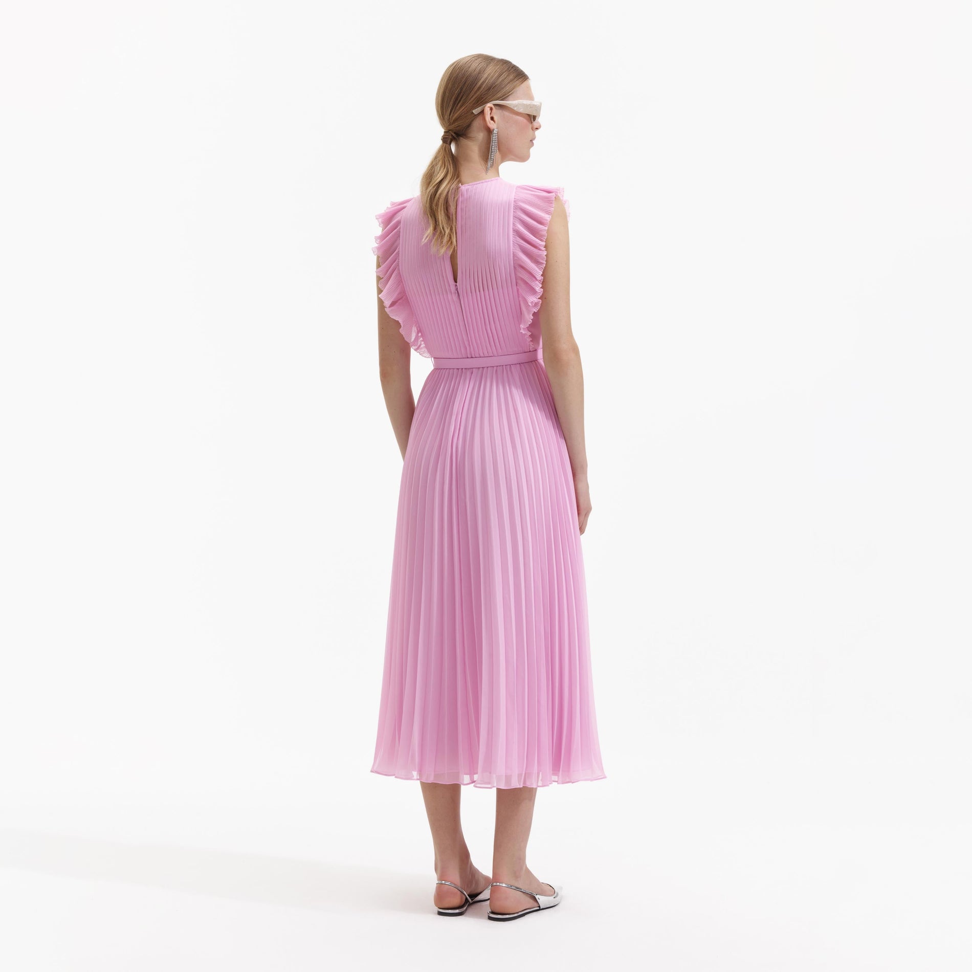 Back view of a woman wearing the Pink Chiffon Tunic Midi Dress