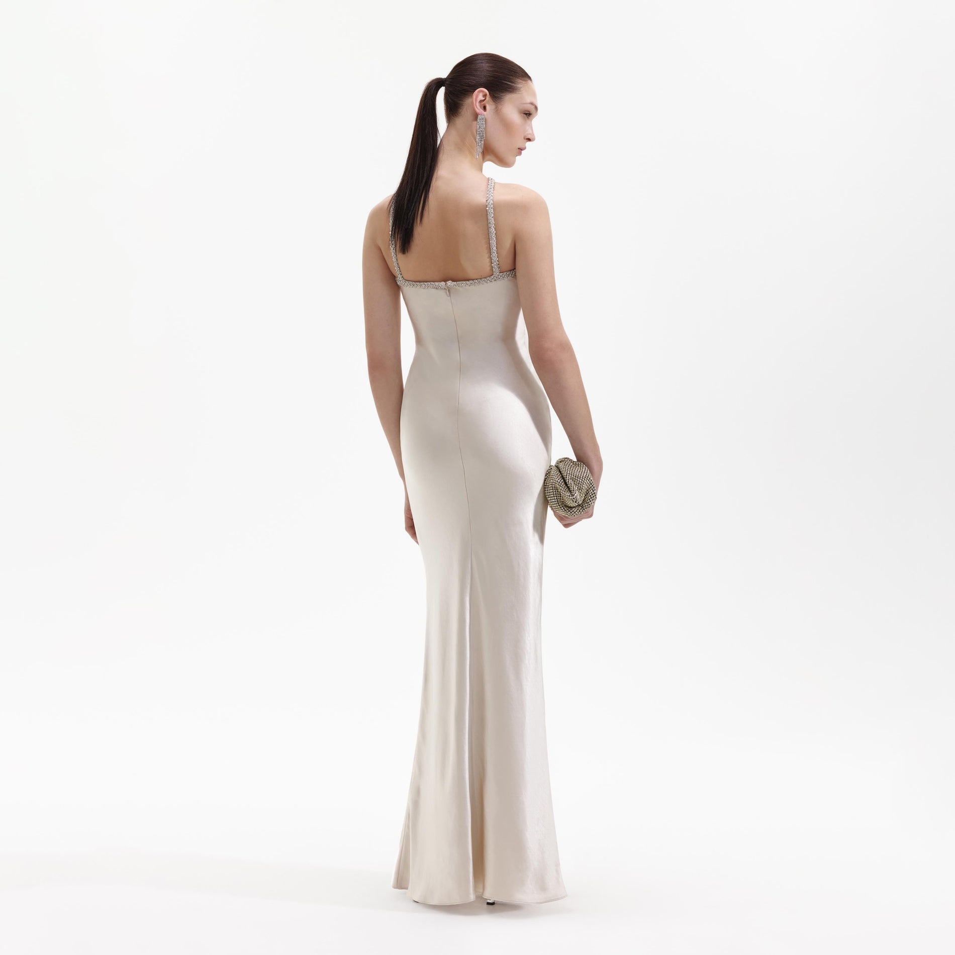 Back view of a woman wearing the Champagne Satin Diamante Maxi Dress