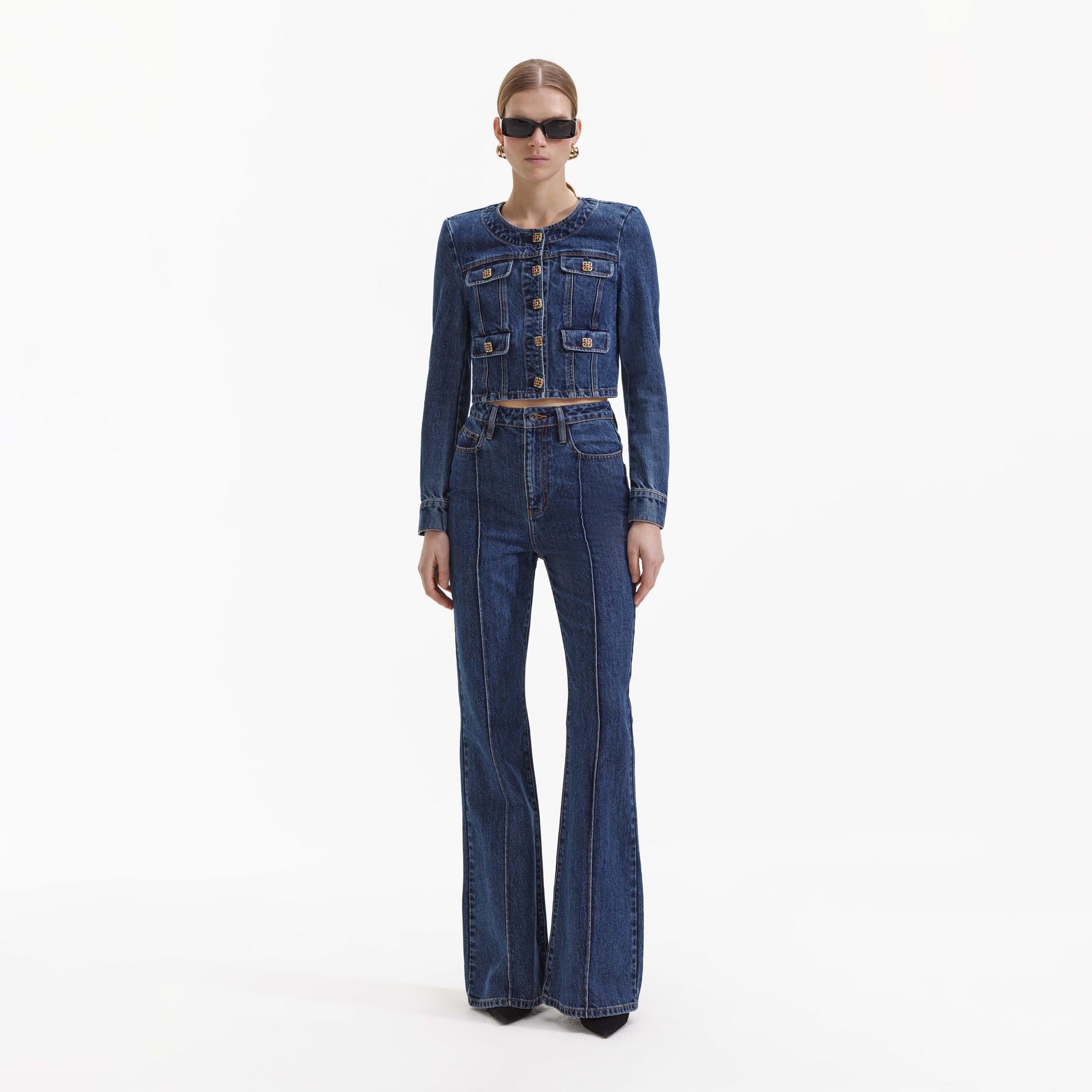 Front view of a woman wearing the Blue Bootcut Denim Jeans