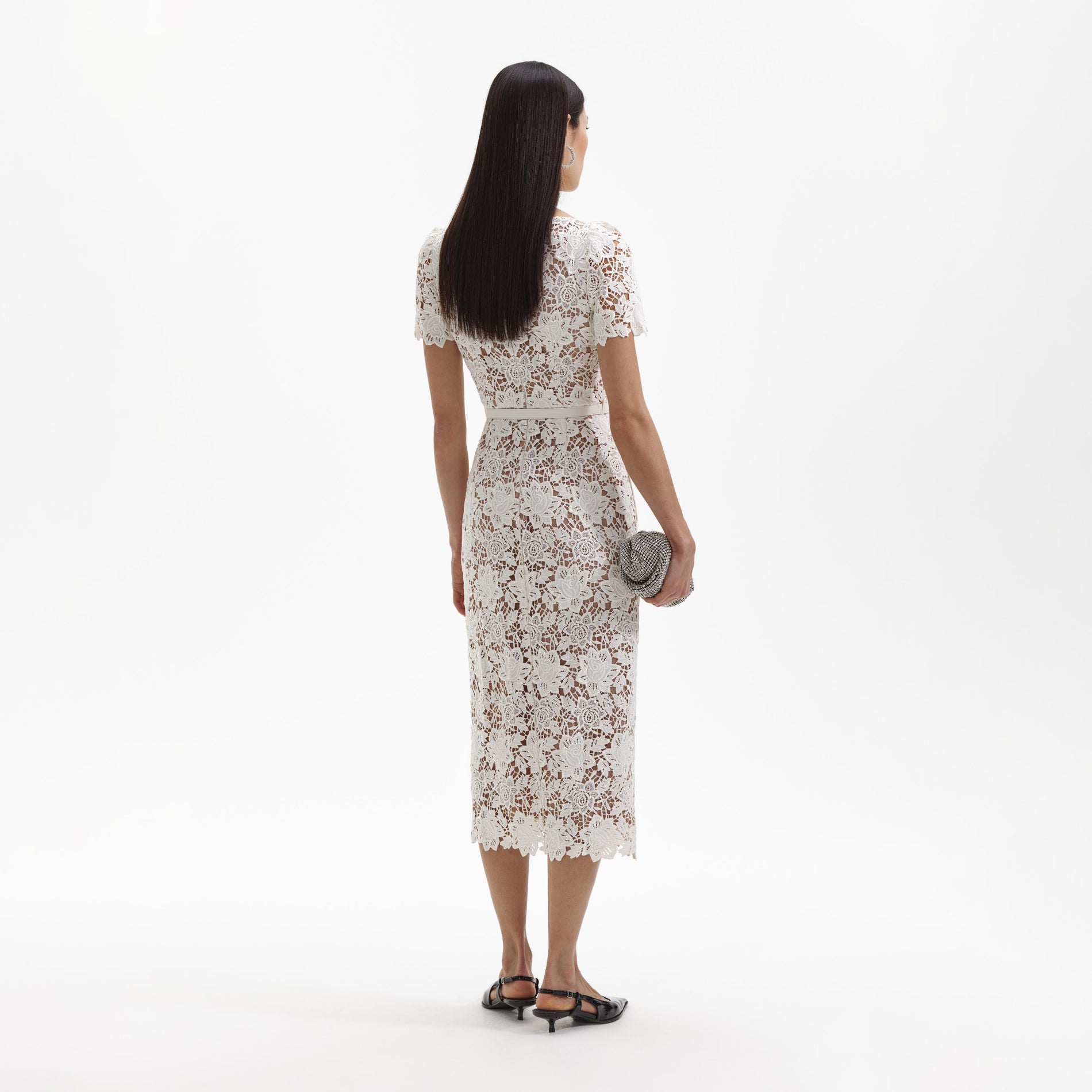 Back view of a woman wearing the White Lace Open Neck Midi Dress