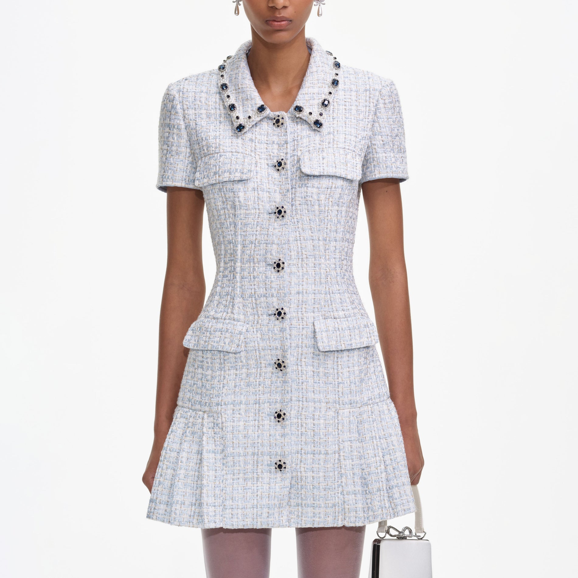 A close up of a woman wearing the Blue Boucle Mini Dress