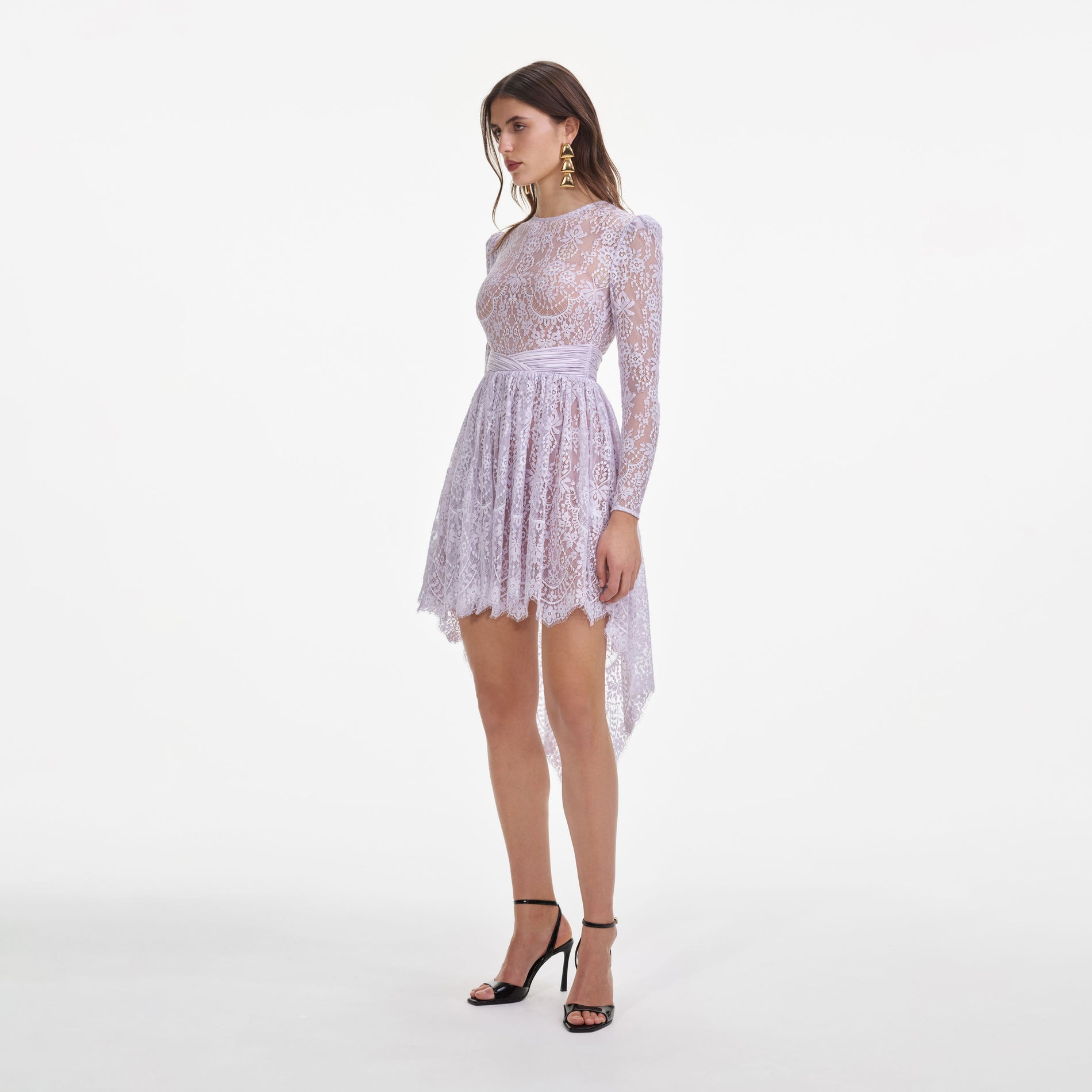 Side view of a woman wearing the Lilac Lace Satin Mini Dress