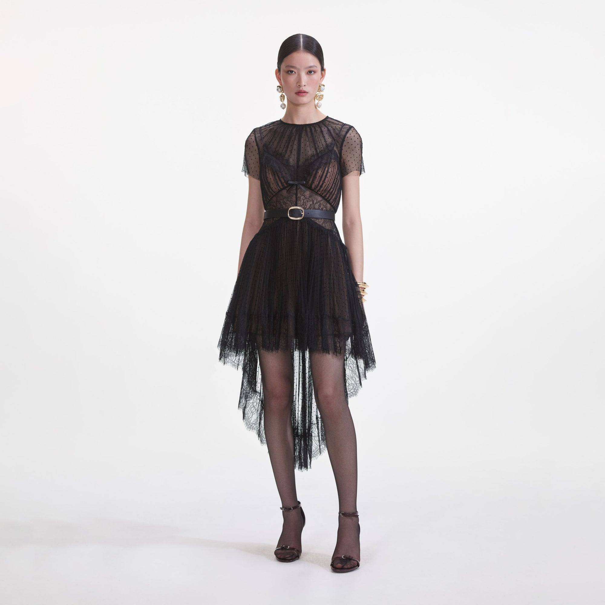 Front view of a woman wearing the Black Dot Mesh Mini Dress