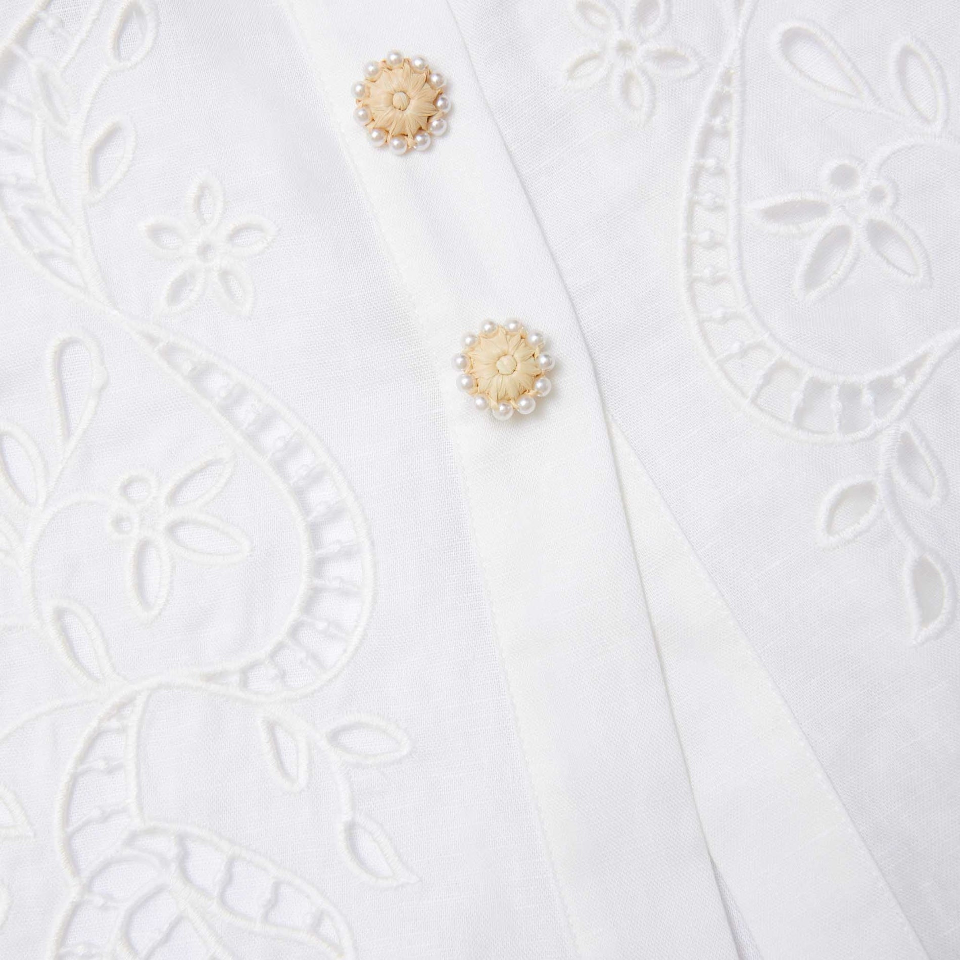 A close up of a woman wearing the Cream Linen Peplum Midi Dress