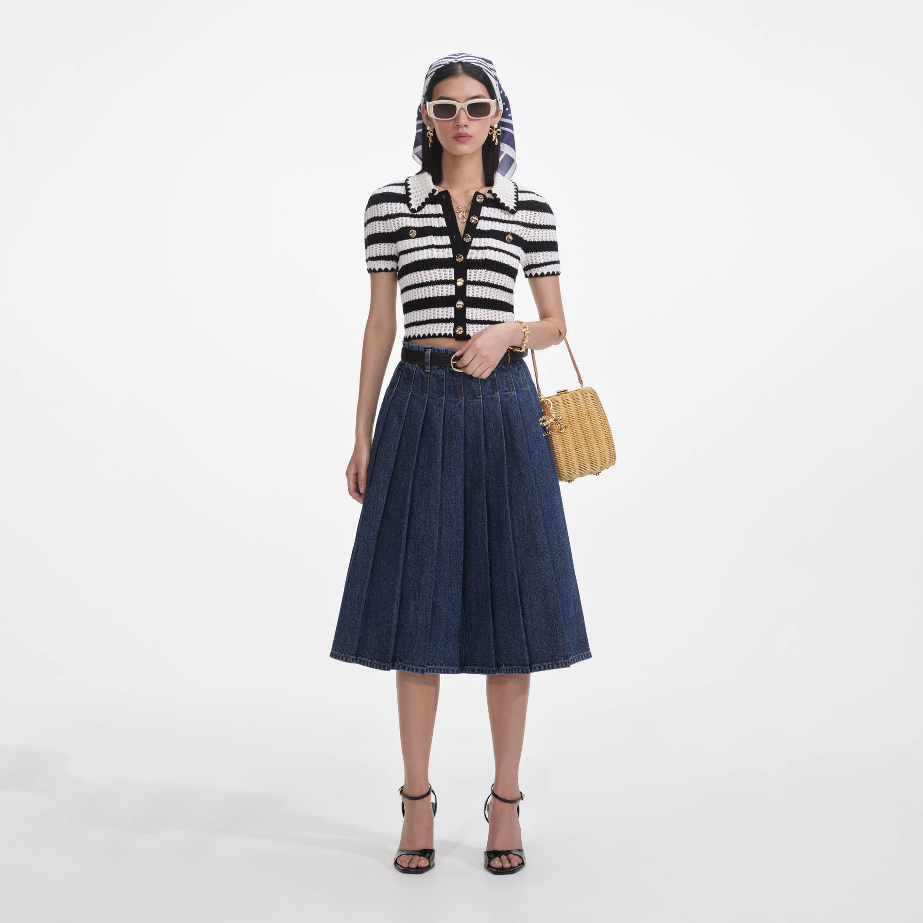 Front view of a woman wearing the Cream And Black Striped Crochet Top