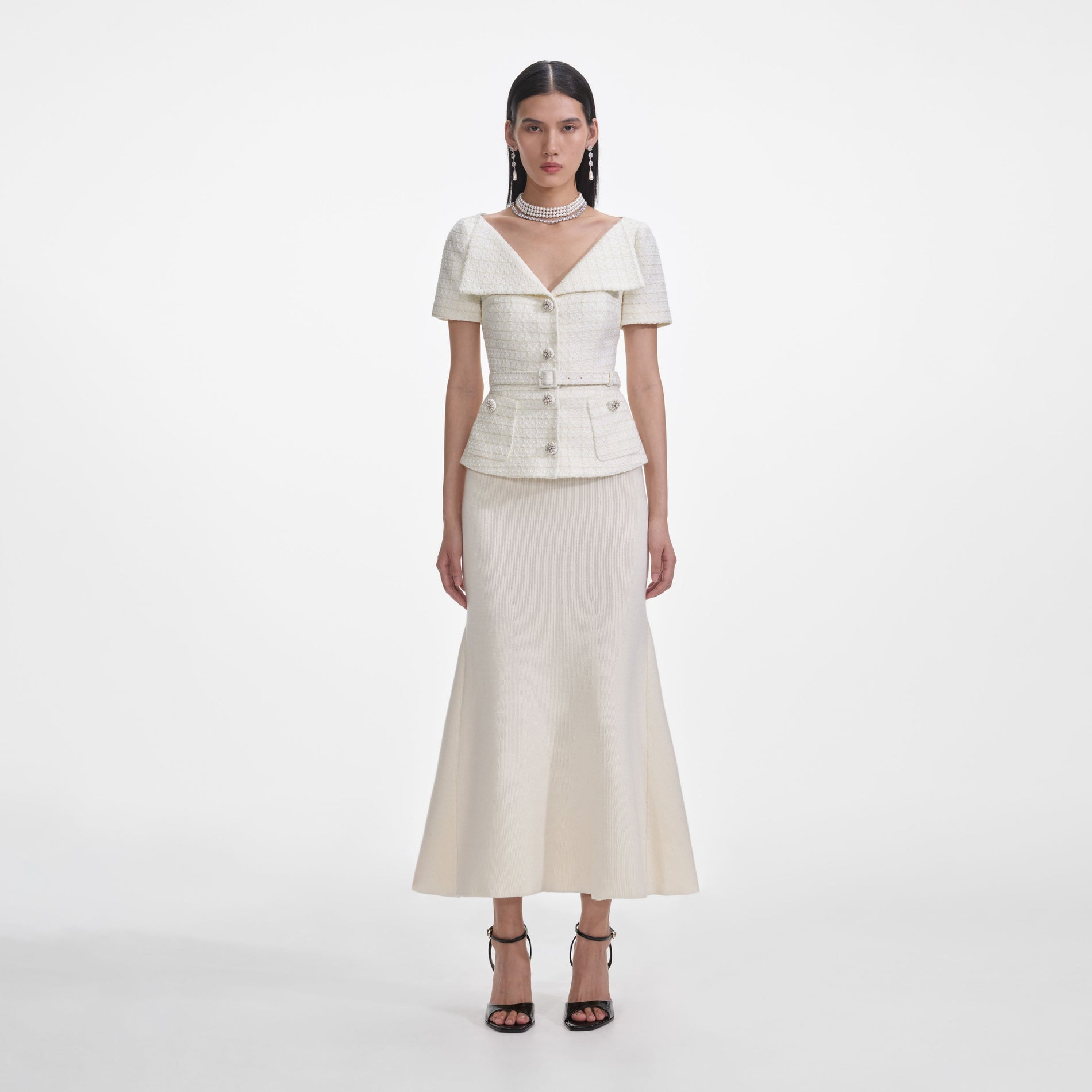 Front view of a woman wearing the Cream Boucle Top