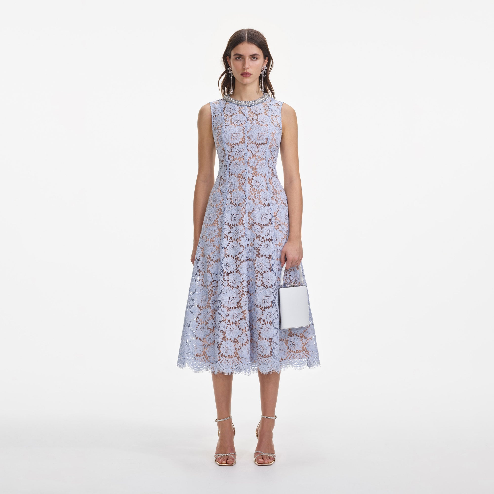 Front view of a woman wearing the Blue Fine Lace Pearl Midi Dress