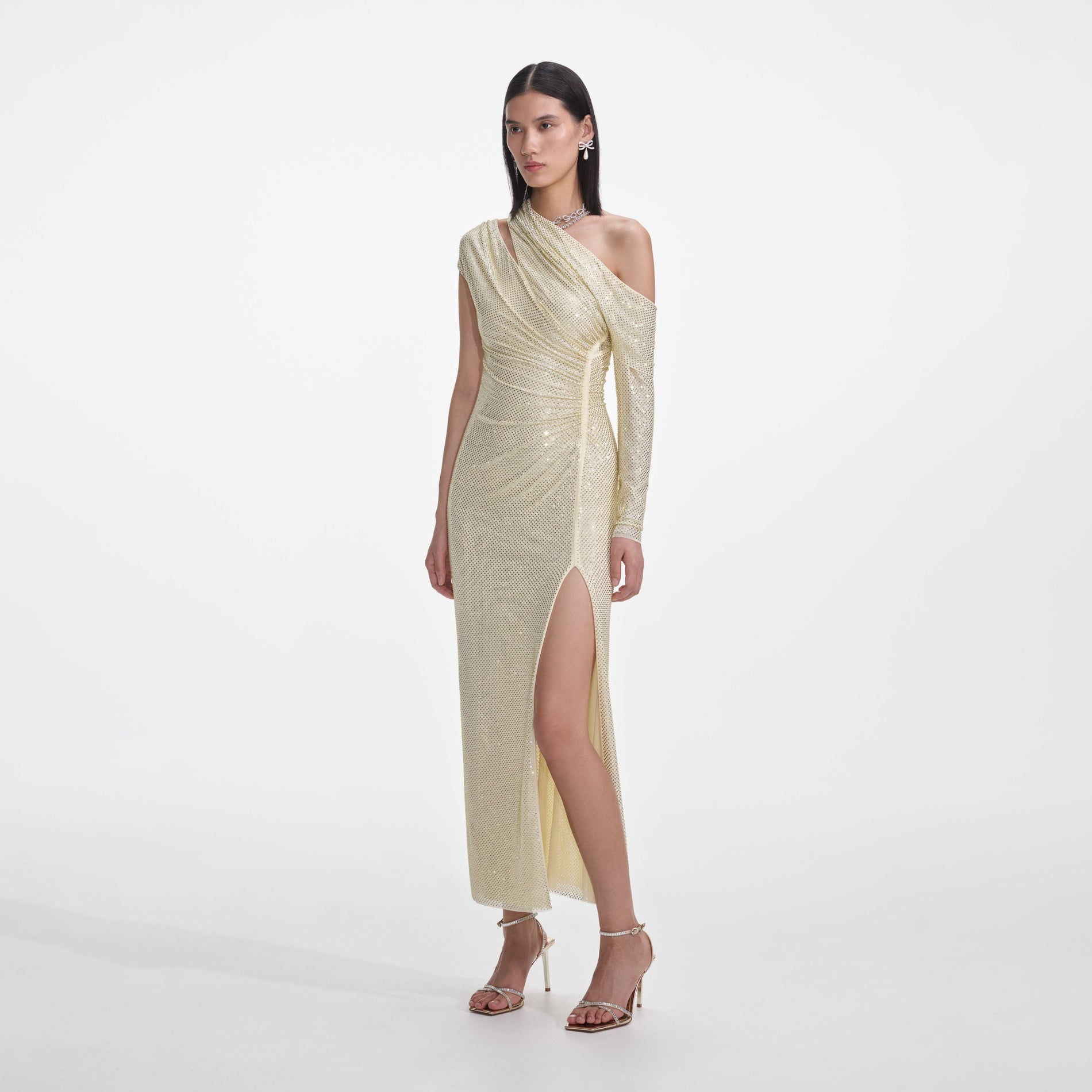 Side view of a woman wearing the Yellow Rhinestone Gathered Midi Dress