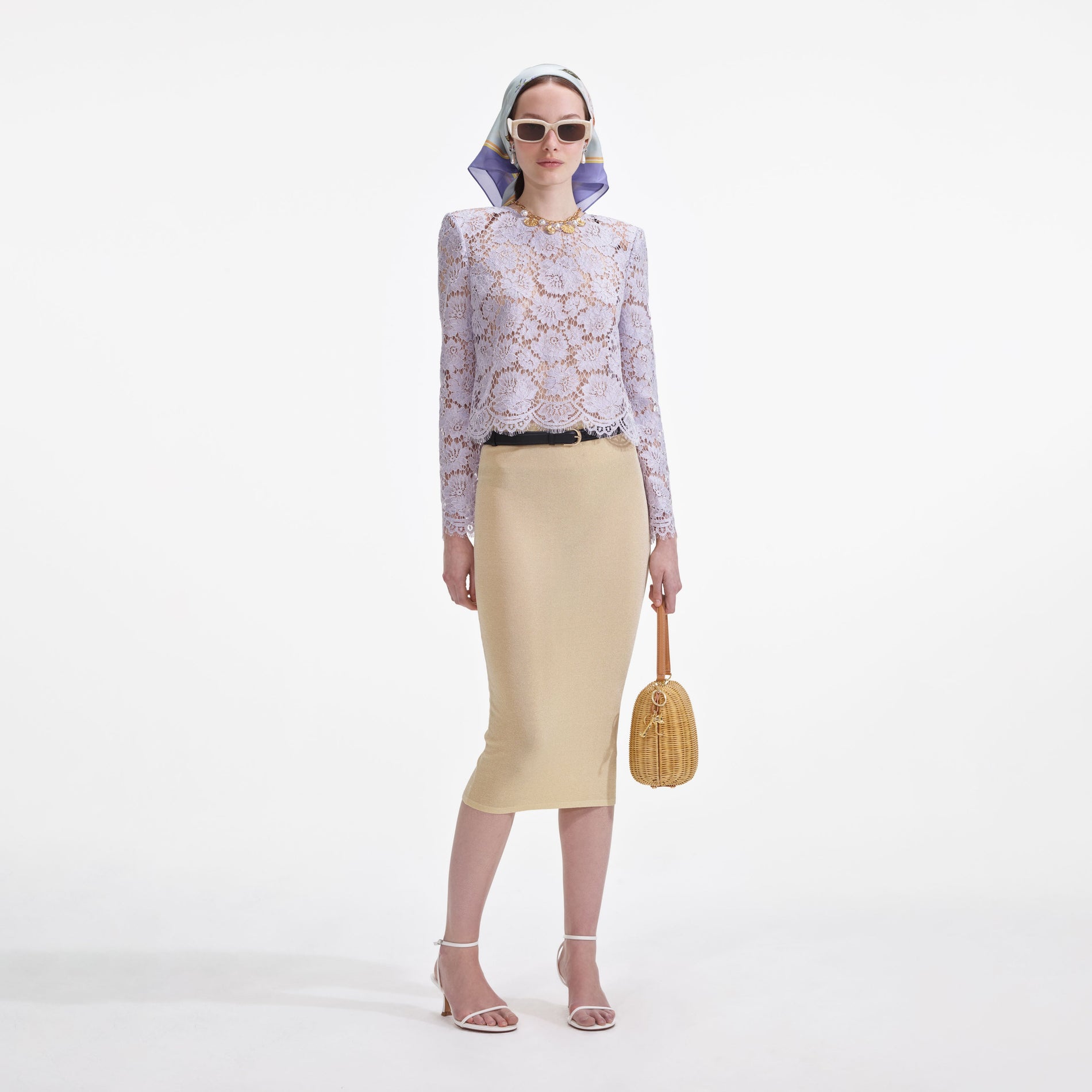 Front view of a woman wearing the Yellow Viscose Knit Midi Skirt