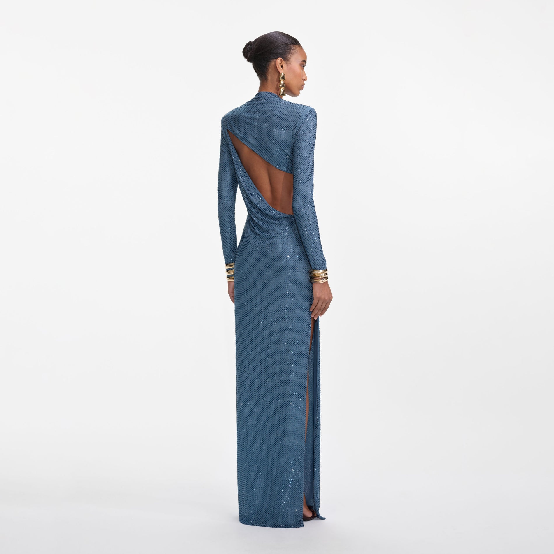 Back view of a woman wearing the Blue Rhinestone Gathered Maxi Dress