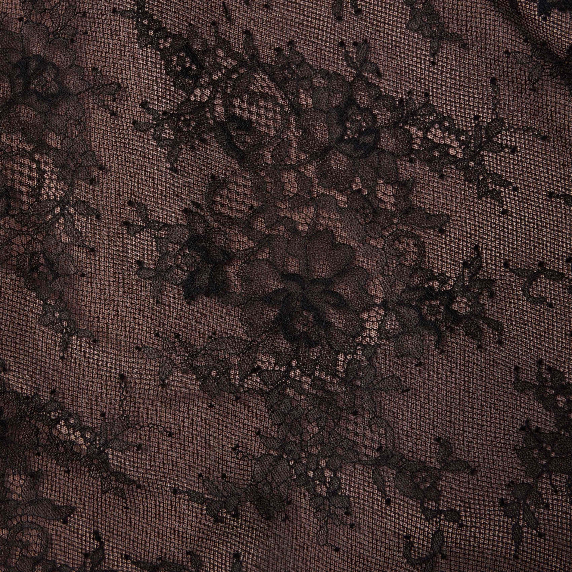 Side view of a woman wearing the Black Lace Midi Skirt