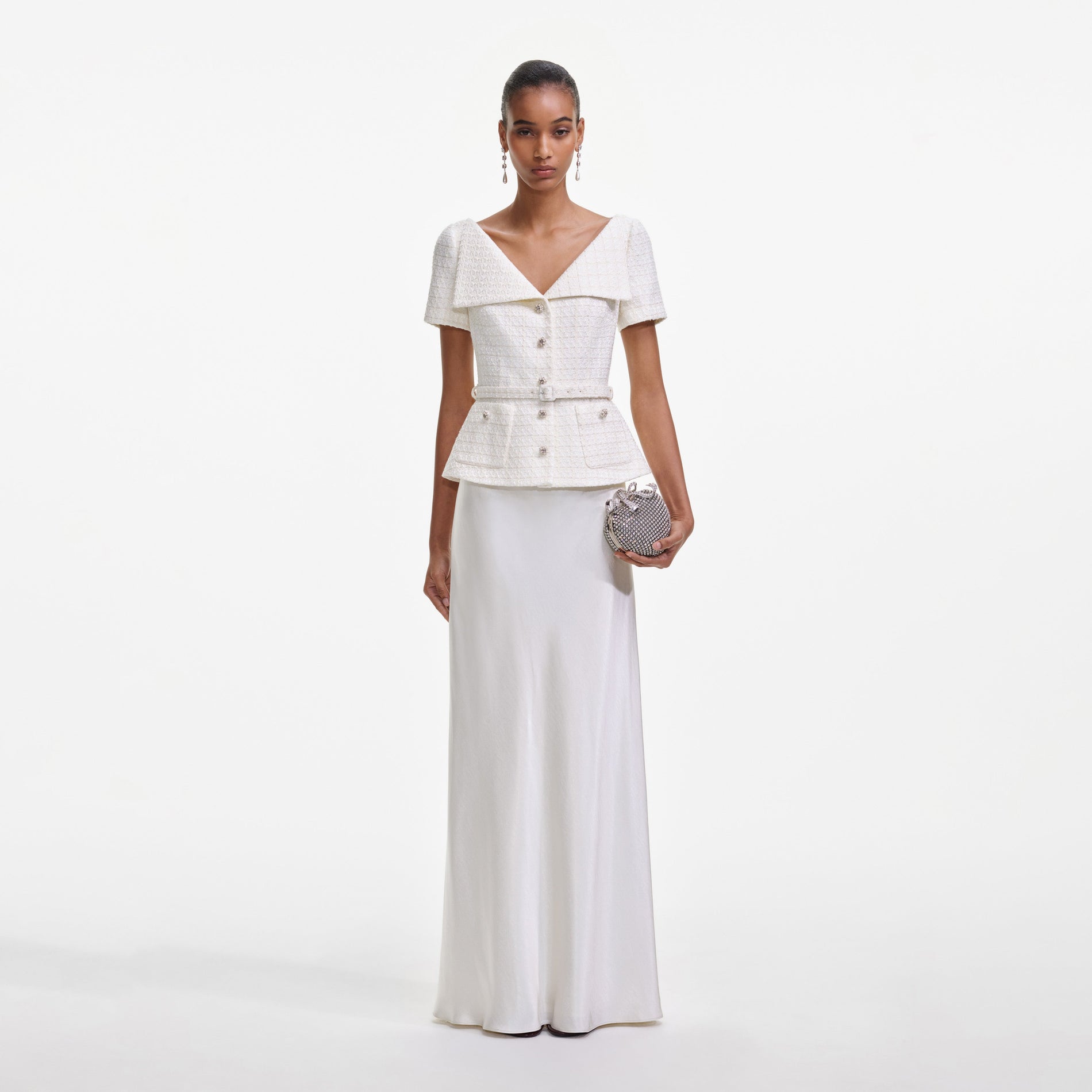 Front view of a woman wearing the Cream Boucle Tailored Maxi Dress