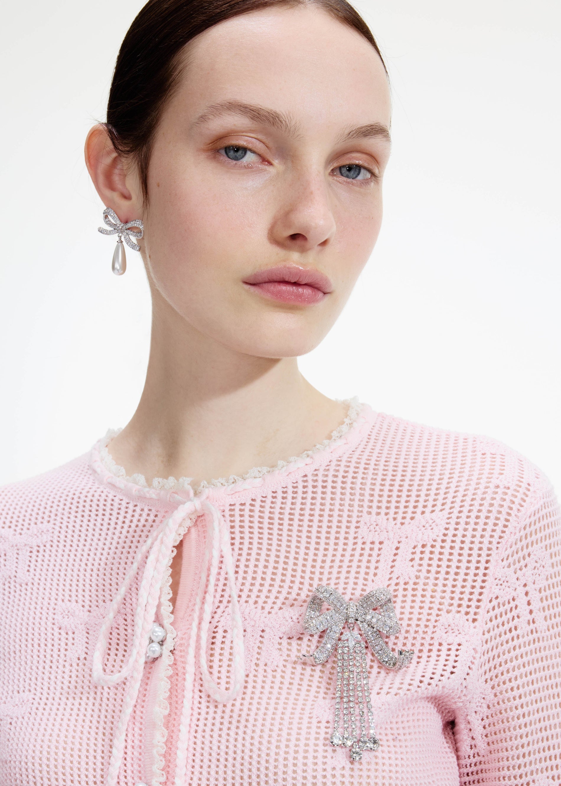 A photo of the Crystal Bow Droplet Brooch