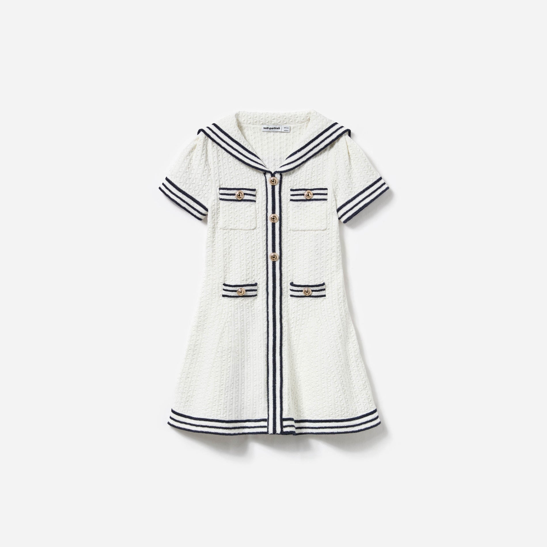 Front view of a woman wearing the Cream Textured Knit Dress