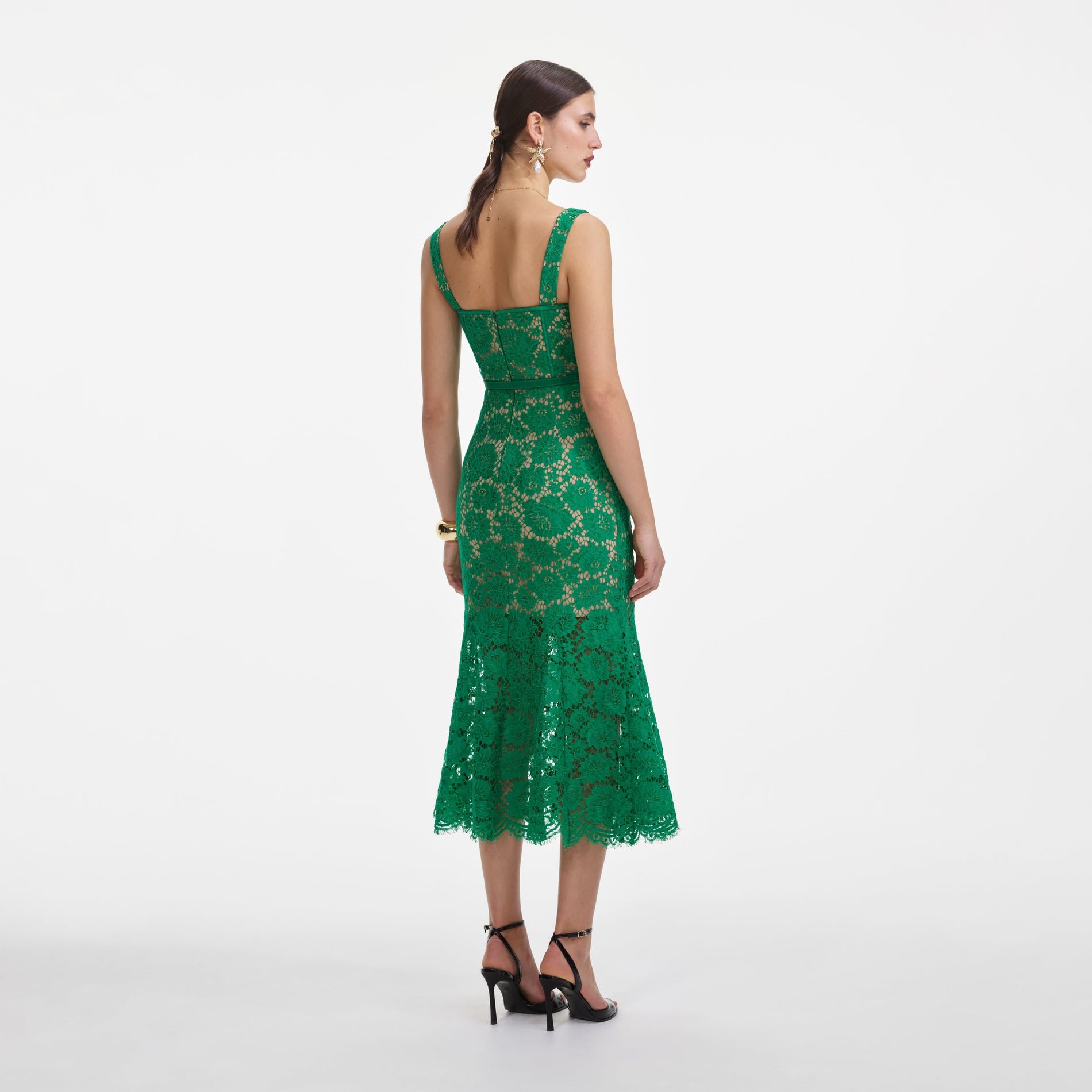 Back view of a woman wearing the Green Fine Lace Midi Dress