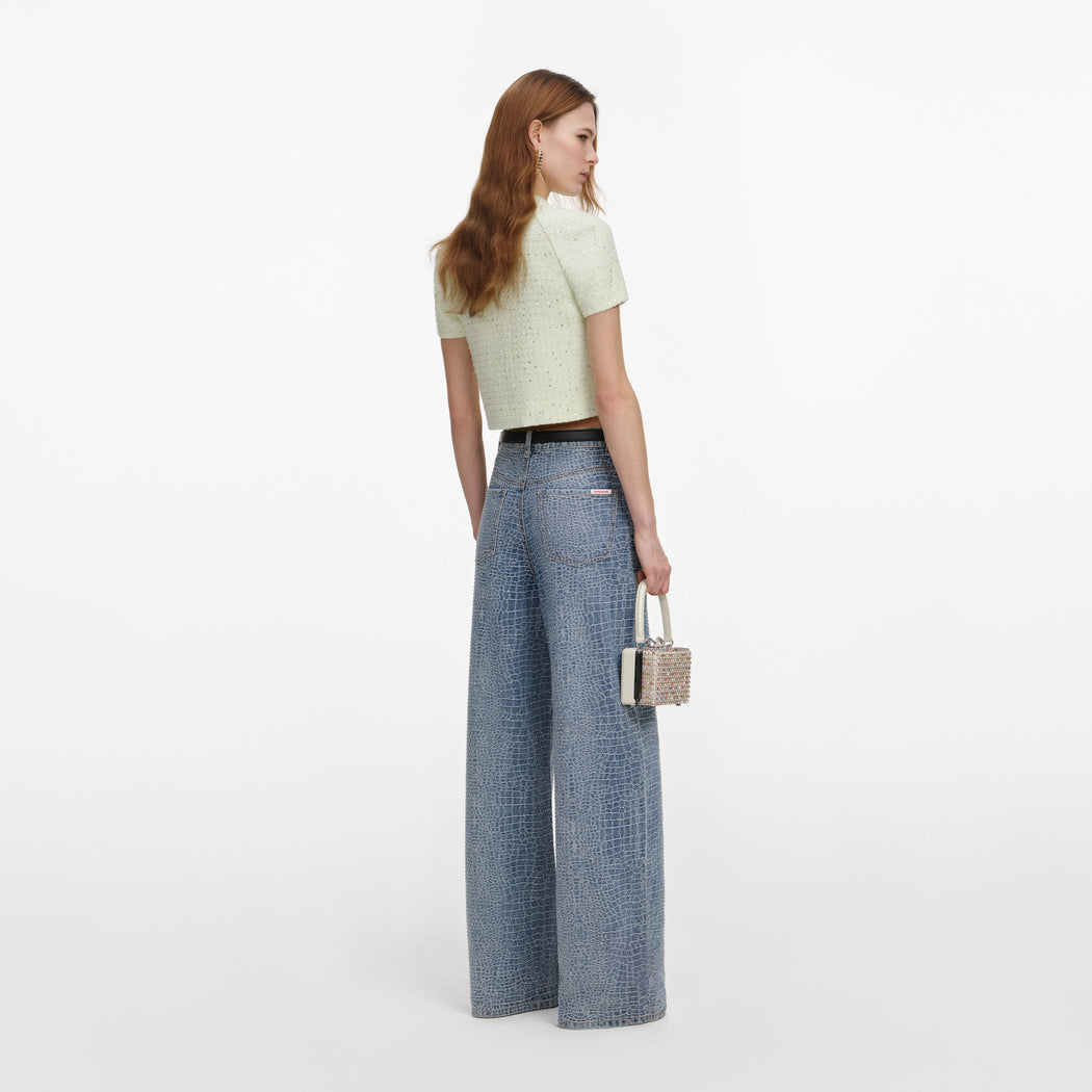 Back view of a woman wearing the Lime Boucle Top