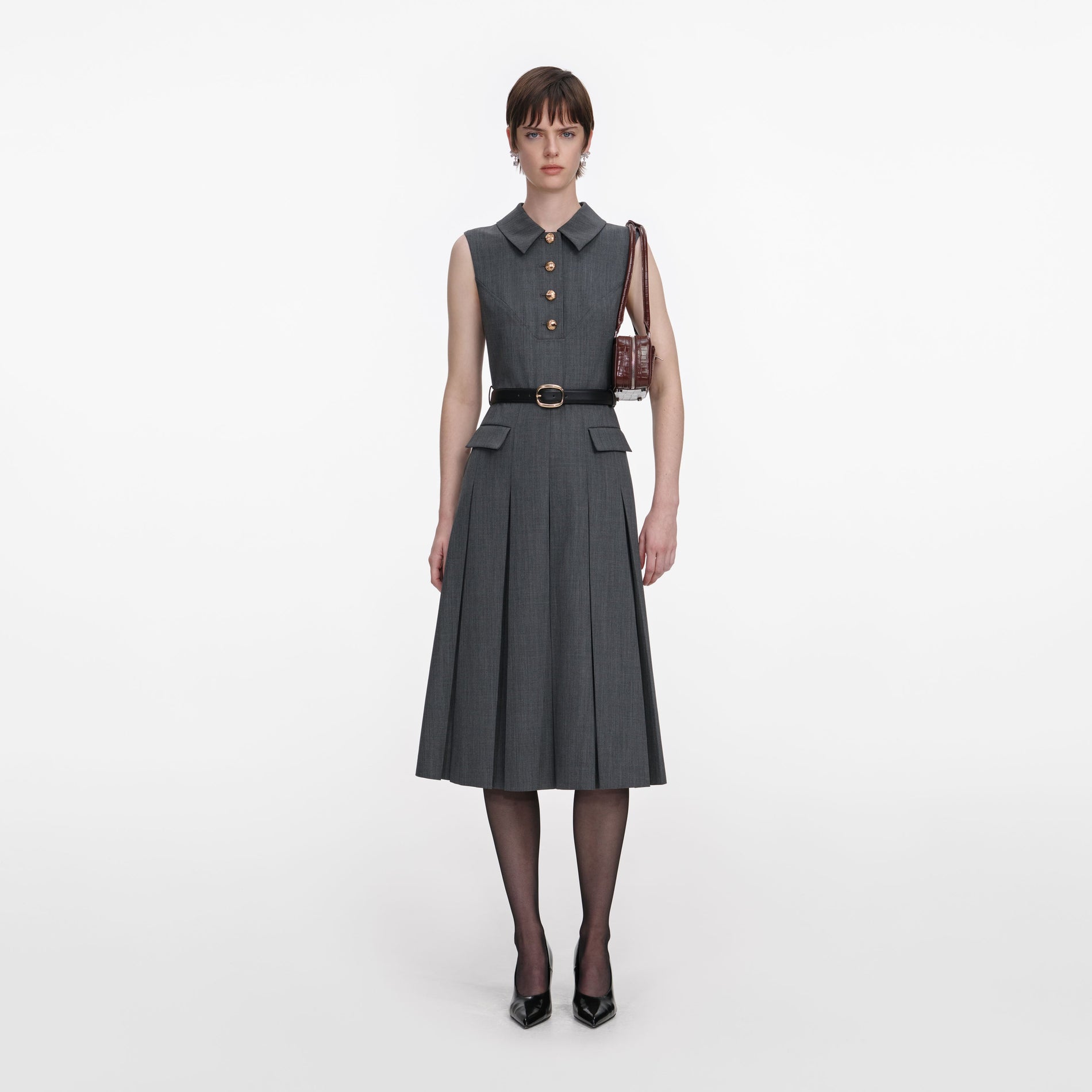 Front view of a woman wearing the Grey Tailored Pleated Midi Dress