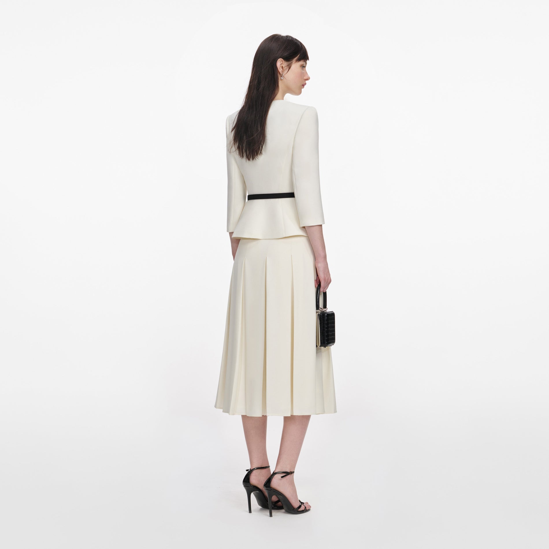 Back view of a woman wearing the Cream 3D Flower Tailored Midi Dress