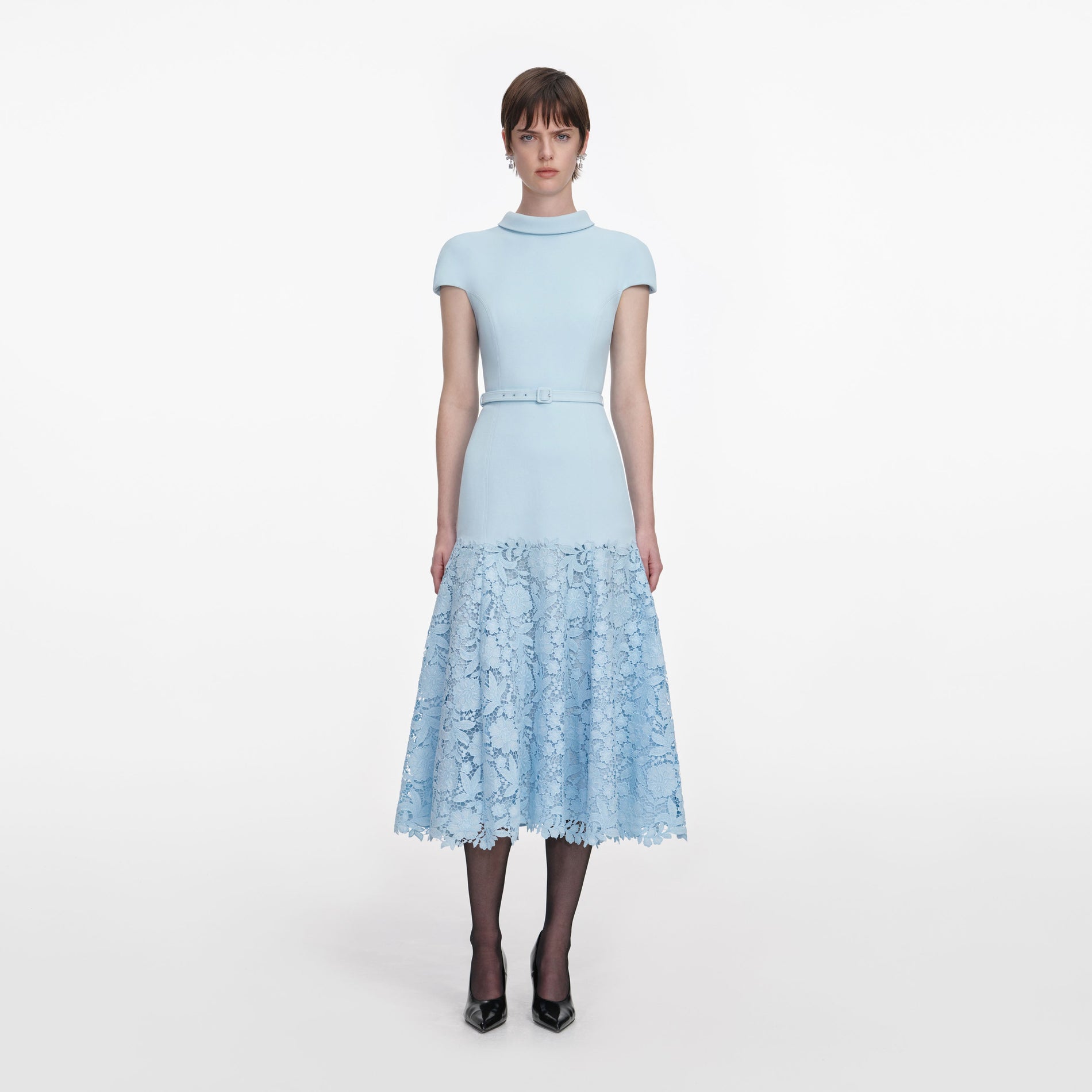 Front view of a woman wearing the Blue Crepe Lace Midi Dress