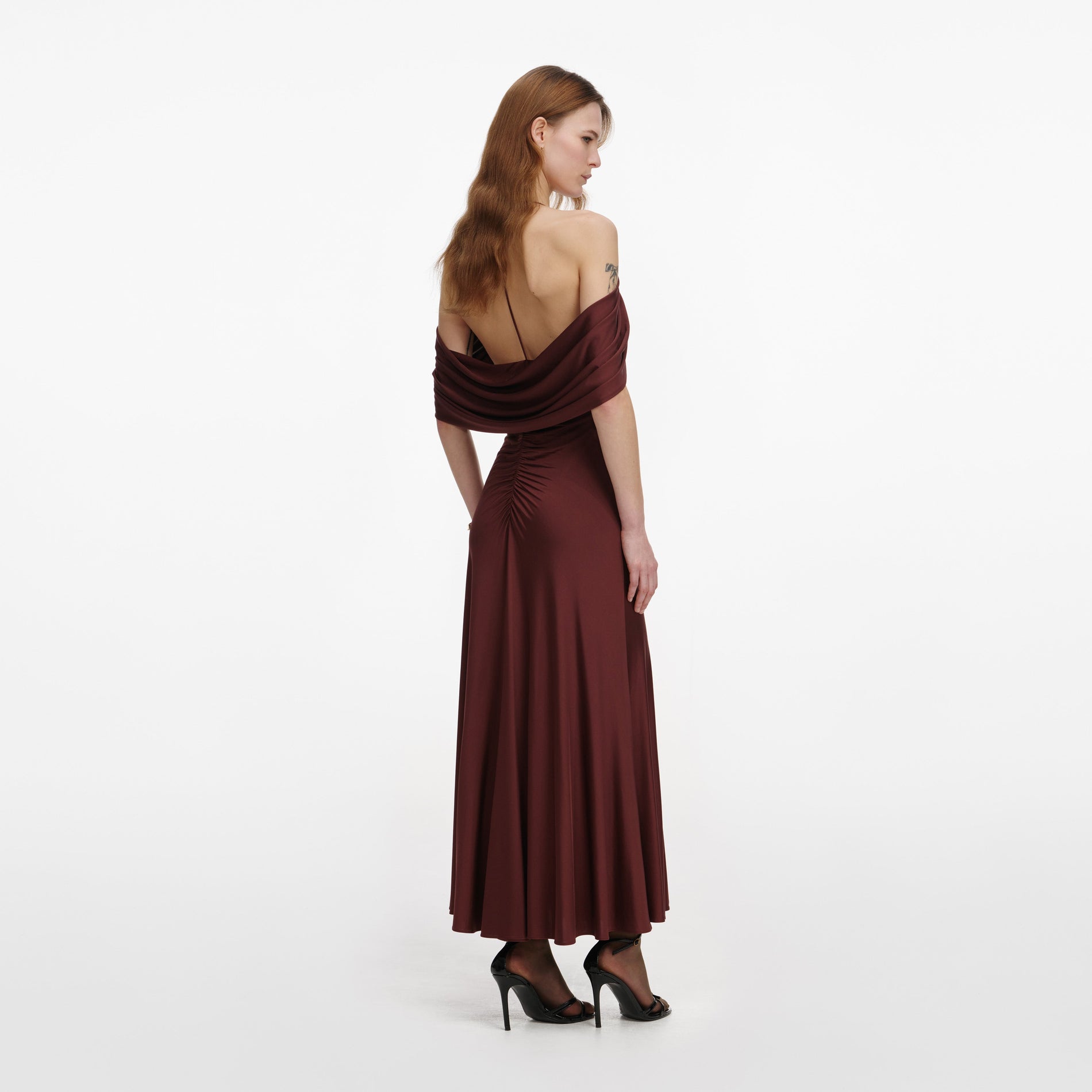 Back view of a woman wearing the Brown Jersey Drape Midi Dress