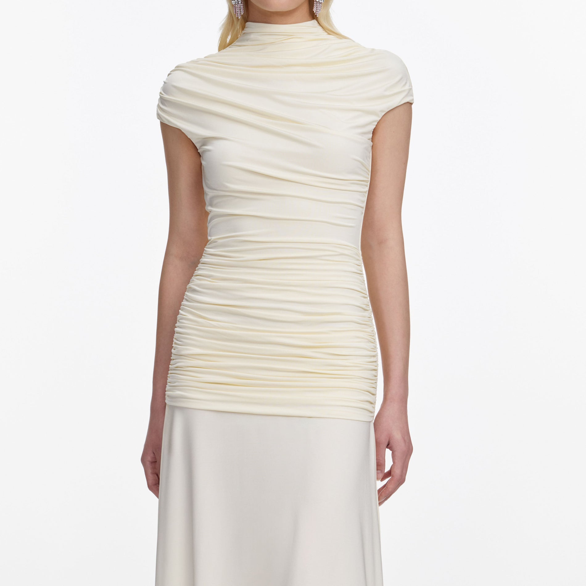 A close up of a woman wearing the Yellow Jersey Draped Maxi Dress