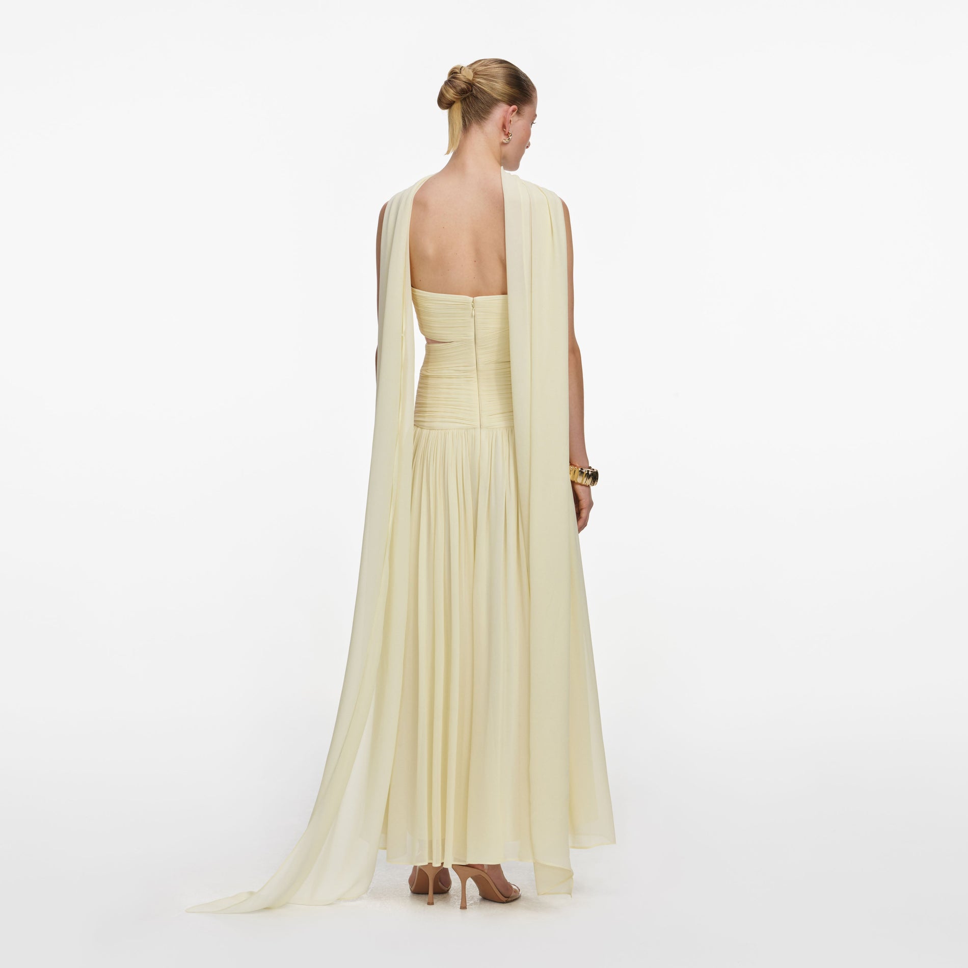 Back view of a woman wearing the Yellow Georgette Scarf Midi Dress