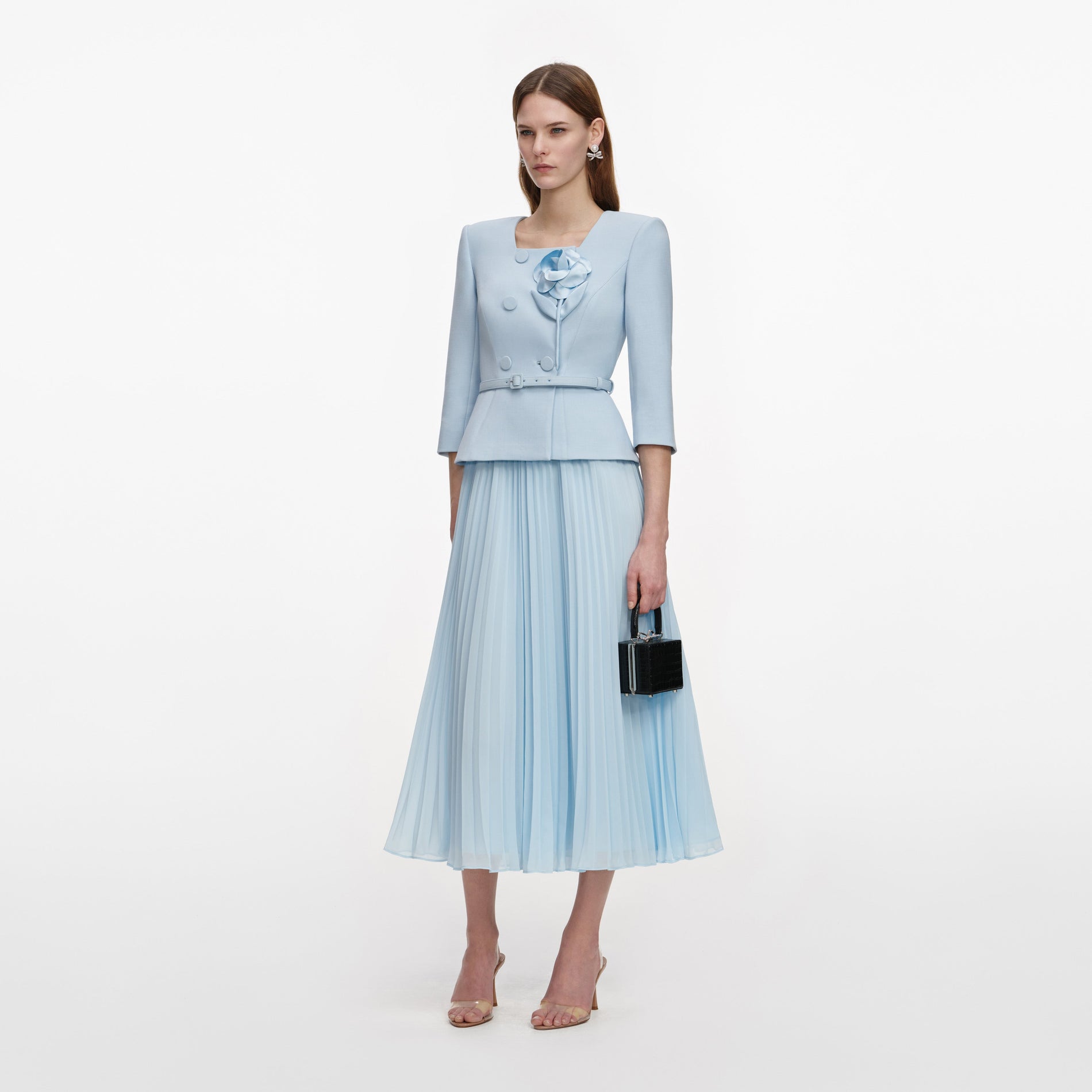 Side view of a woman wearing the Blue 3D Flower Chiffon Midi Dress