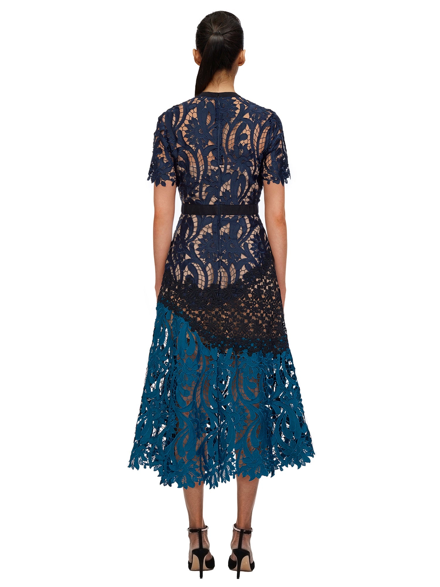Back view of a woman wearing the Prairie Midi Dress