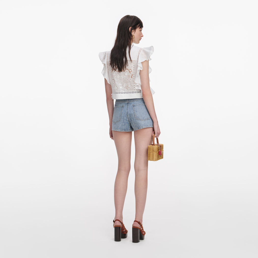 Back view of a woman wearing the White Ramie Lace Frill Top