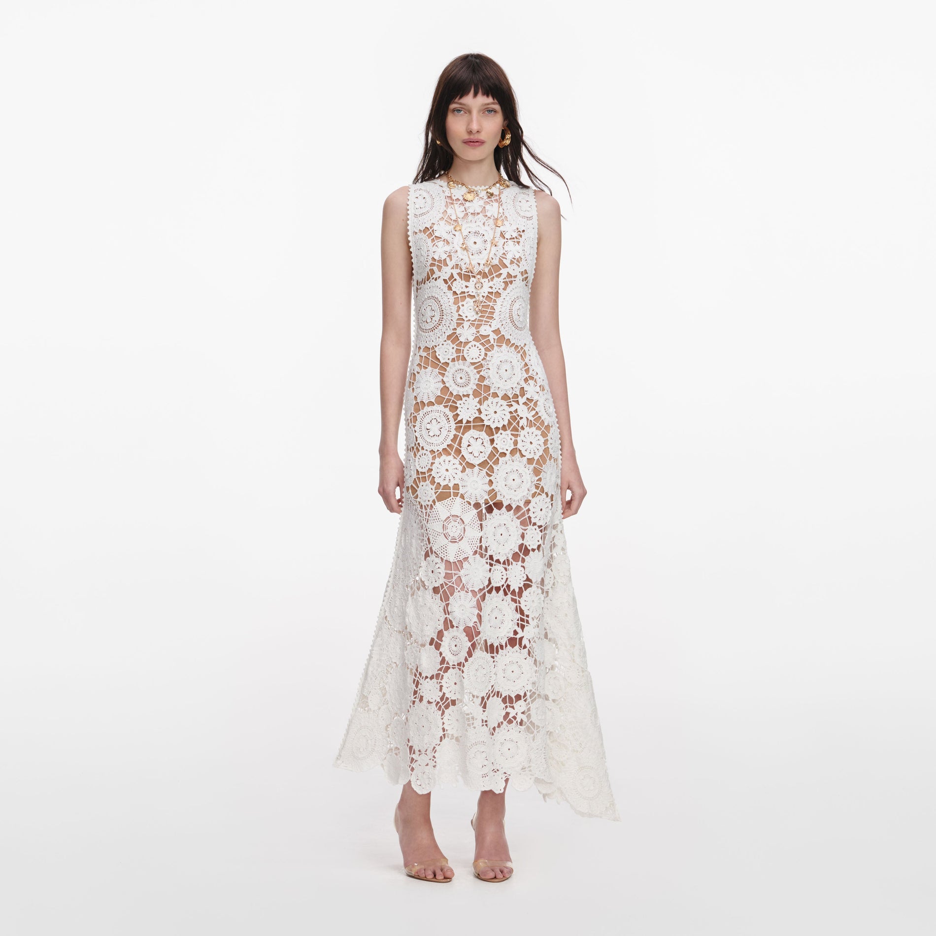 Front view of a woman wearing the White Crochet Maxi Dress