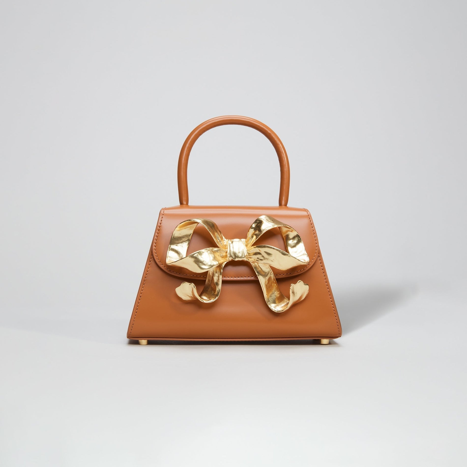 The Bow Mini in Tan with Gold Hardware