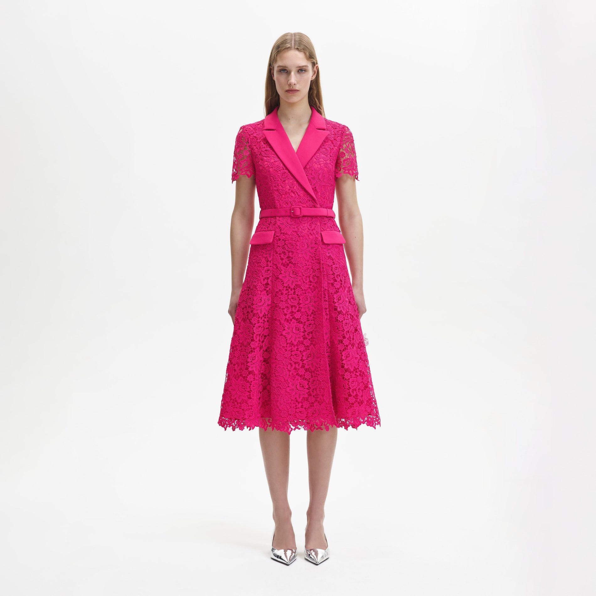 A woman wearing the Magenta Lace Midi Dress