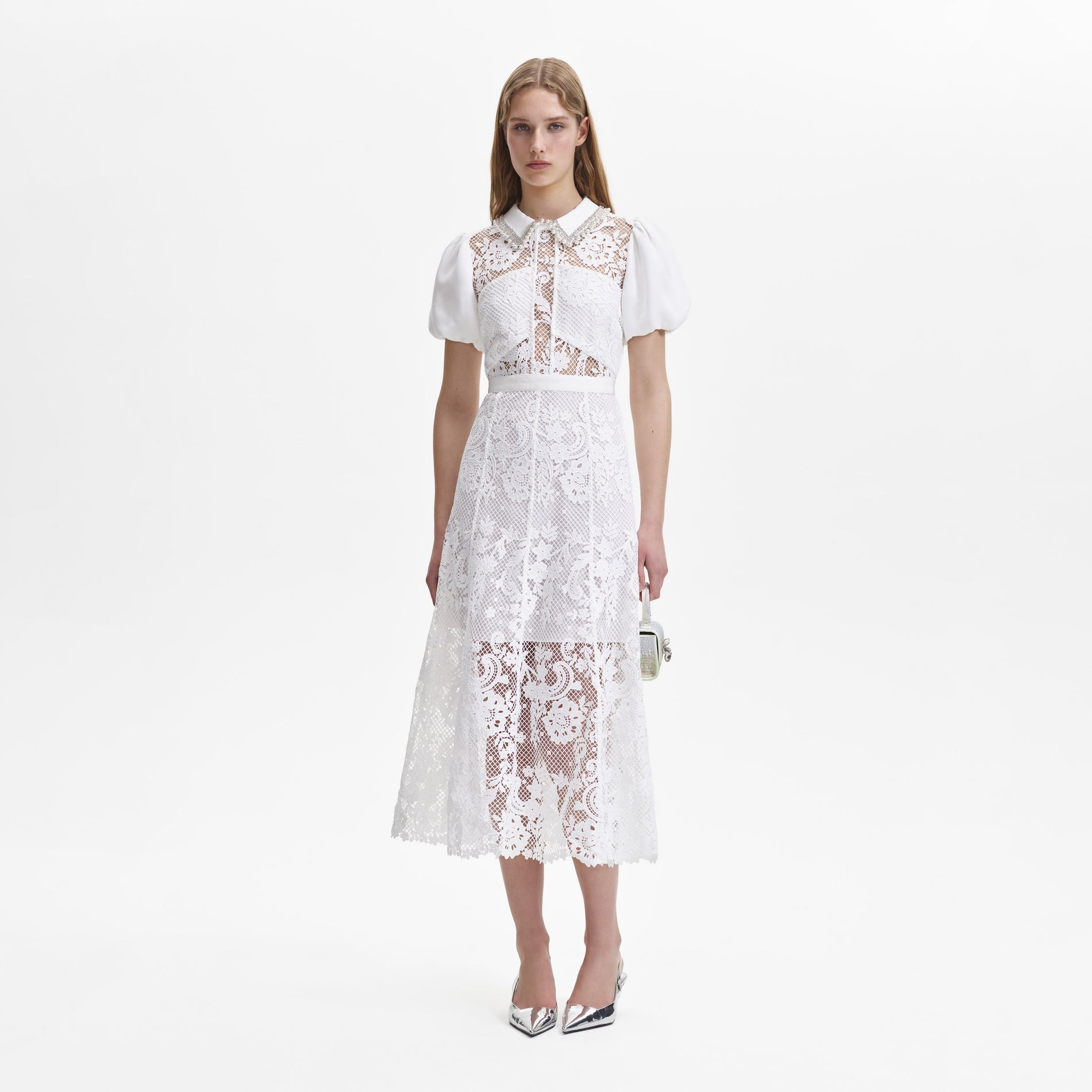 A woman wearing the White Lace Diamante Collar Midi Dress