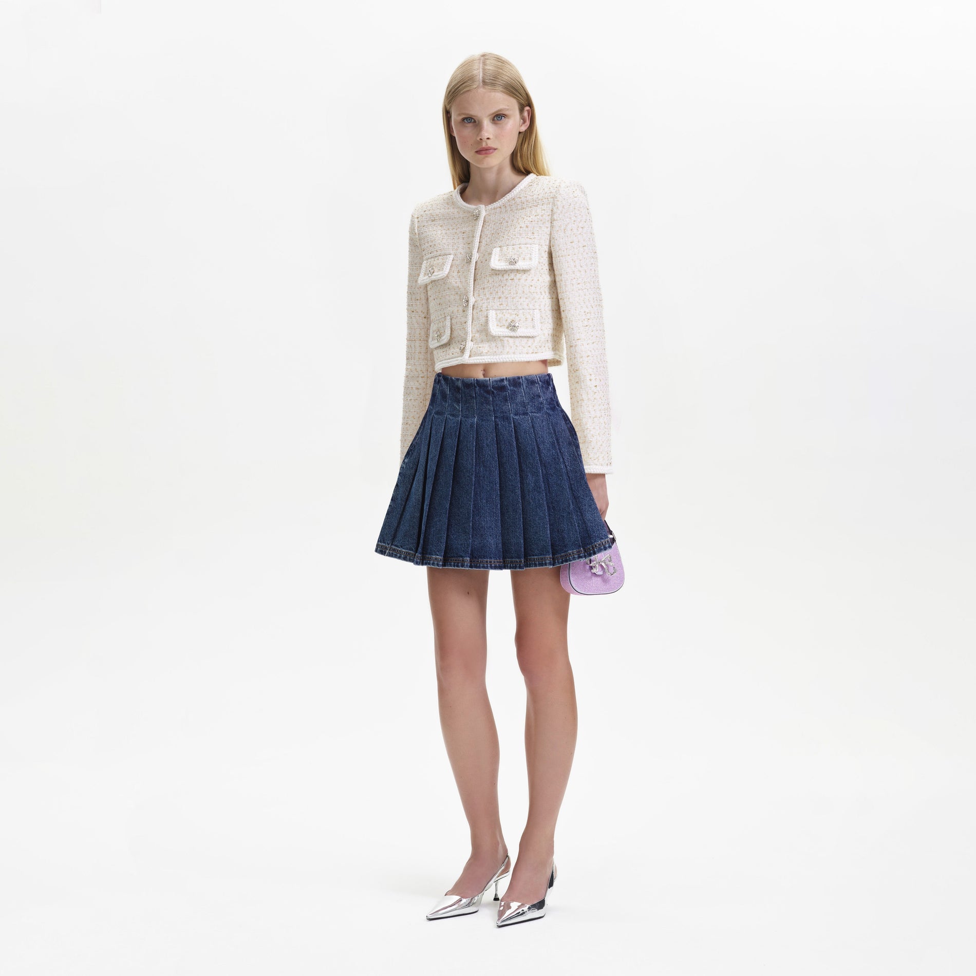 A woman wearing the Cream Boucle Jacket